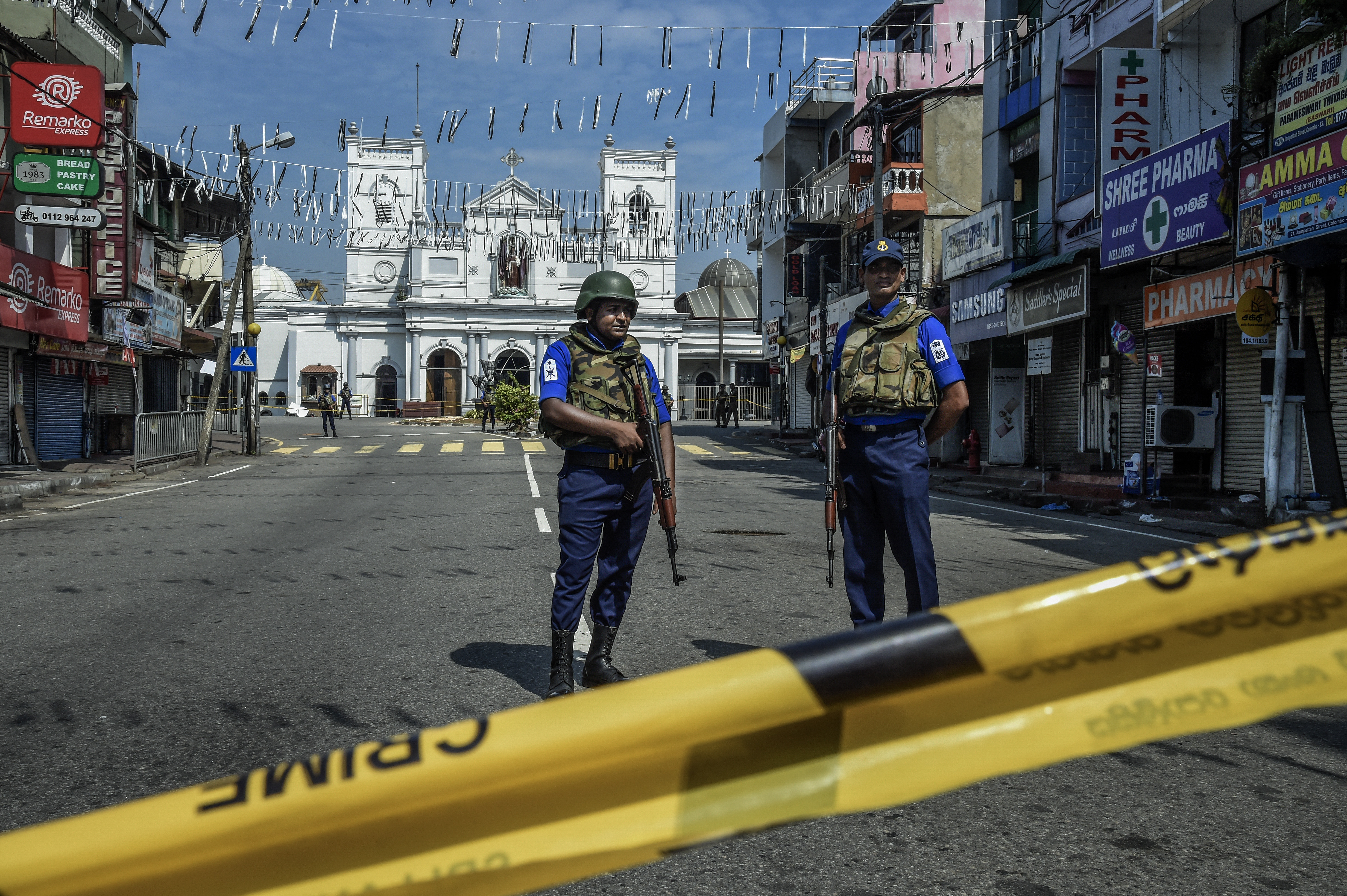 Security personnel stand guard at St Anthony's Church on April 24, 2019 in Colombo, Sri Lanka. 