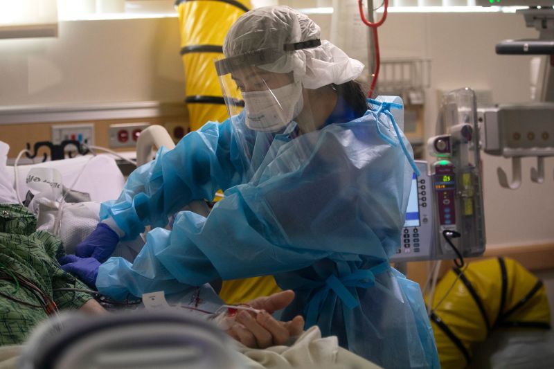 A nurse tends to a Covid-19 patient inside the intensive care unit of Providence St. Jude Medical Center on December 25 in Fullerton, California. 