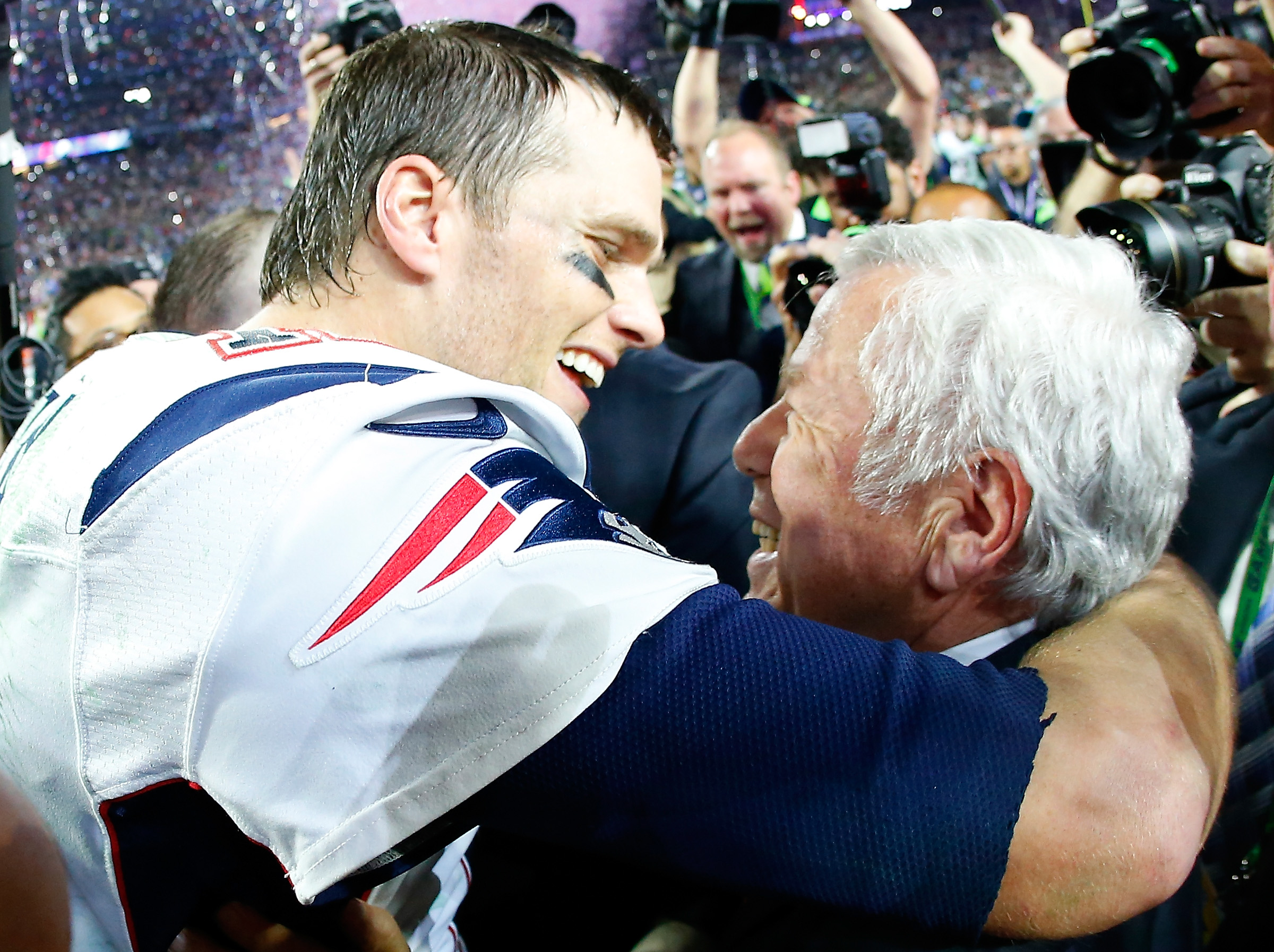 Tom Brady embraces New England Patriots owner Robert Kraft after defeating the Seattle Seahawks in Super Bowl XLIX in 2015.