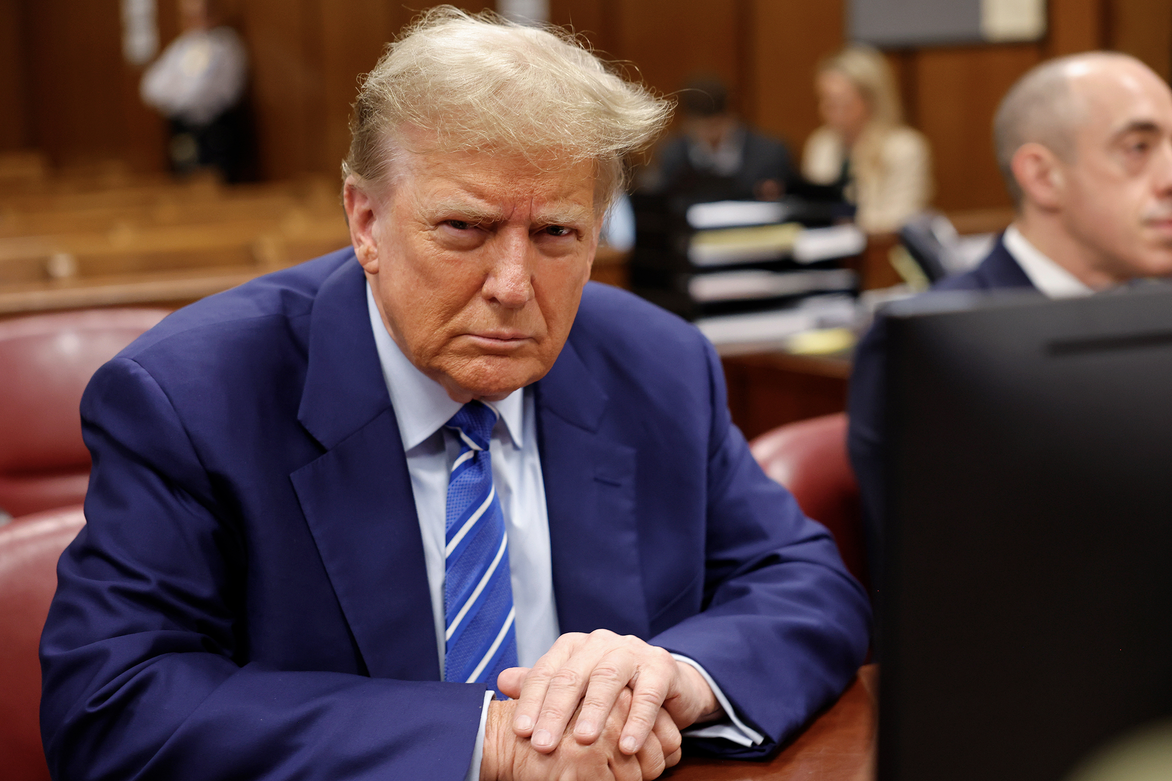Former President Donald Trump sits in the courtroom during the second day of his criminal trial at Manhattan Criminal Court on April 16 in New York City.