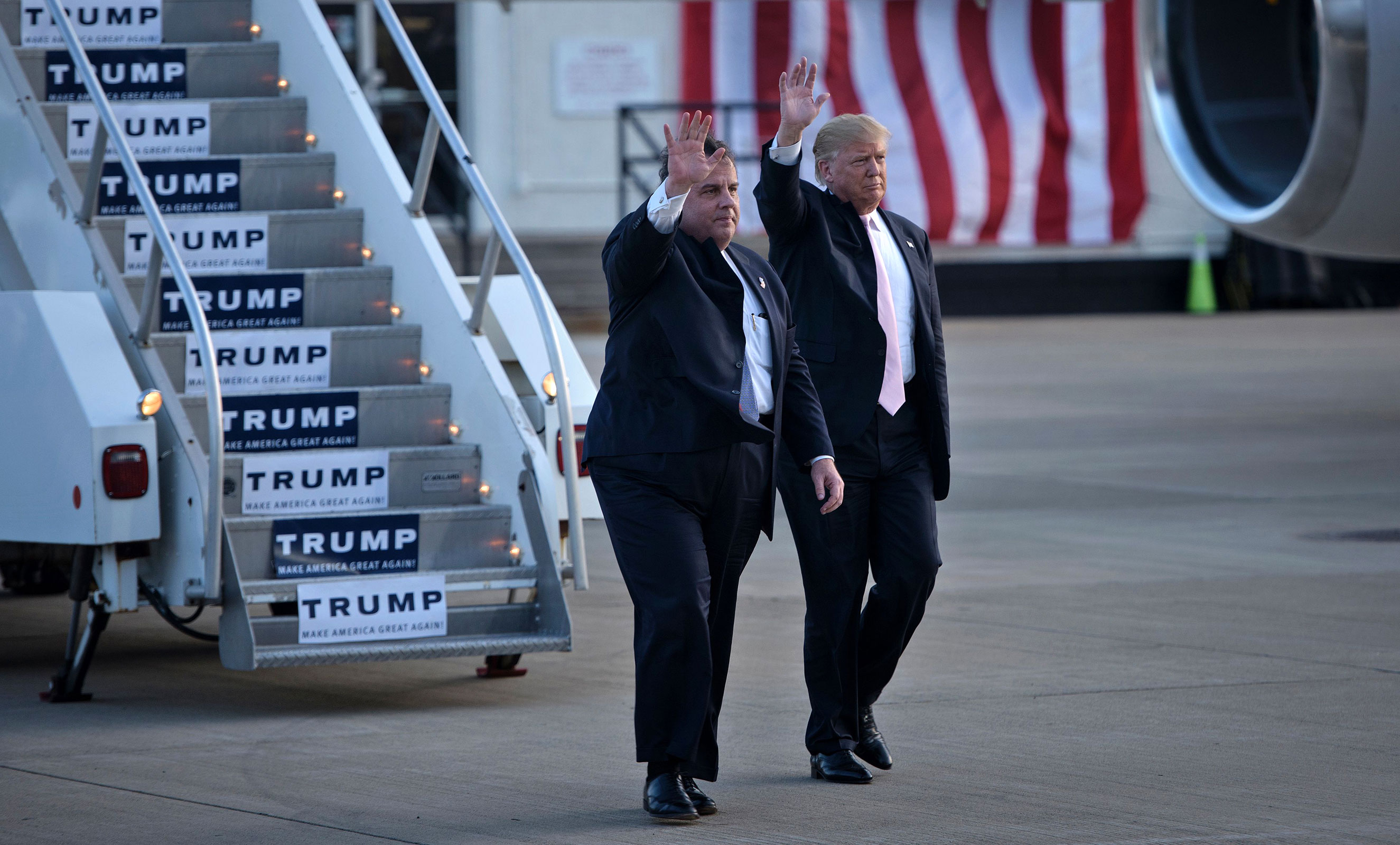 In this 2016 photo, Republican presidential hopeful Donald Trump arrives with New Jersey Governor Chris Christie for a rally March 14, 2016 in Vienna Center, Ohio.