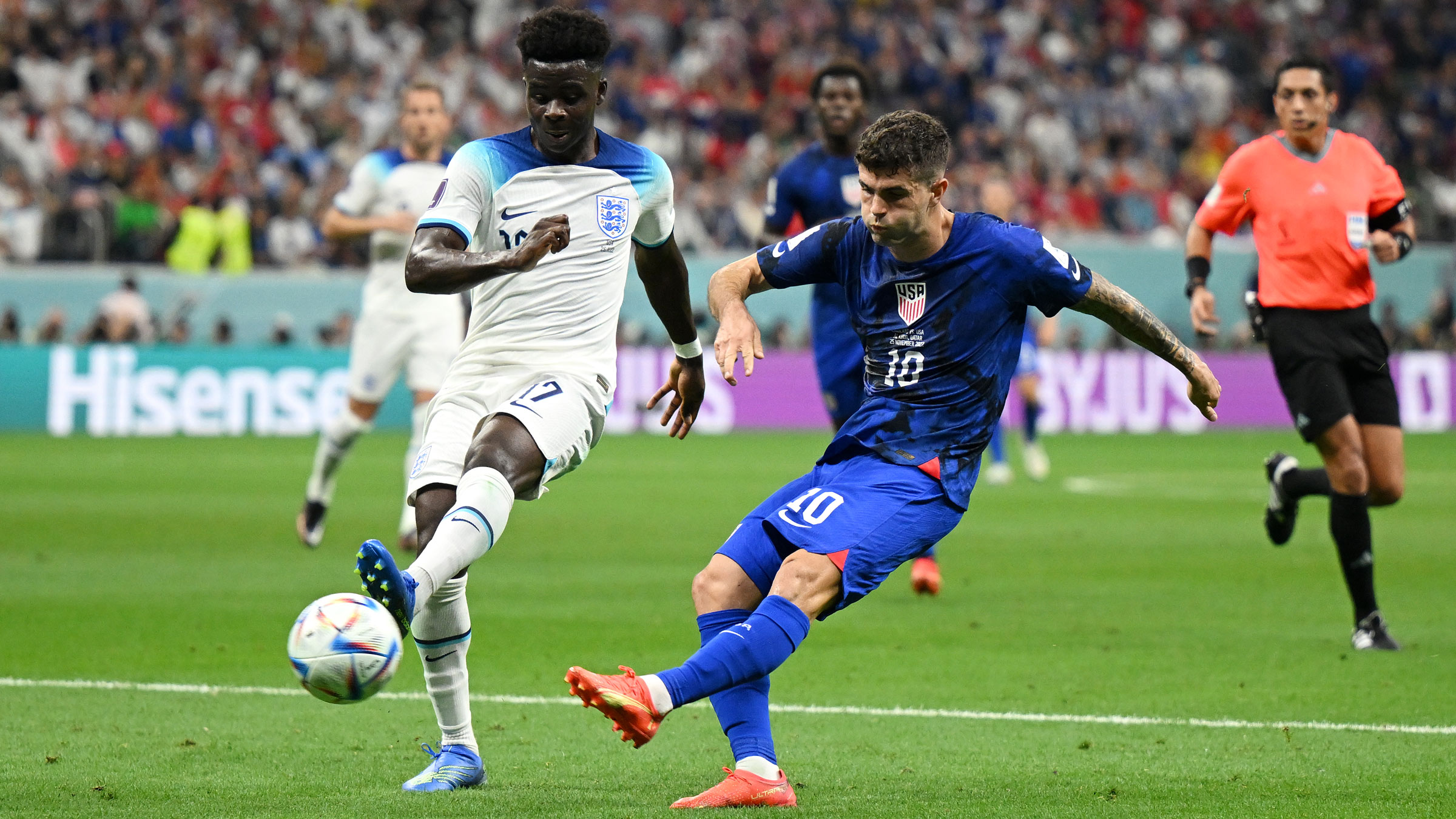 US star Christian Pulisic takes a shot in the first half that smacked off the crossbar against England.