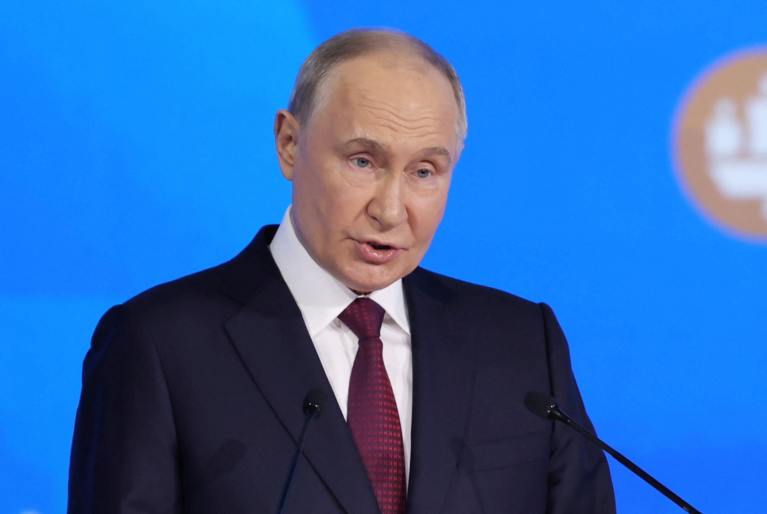 Russian President Vladimir Putin delivers a speech at the St. Petersburg International Economic Forum in Saint Petersburg, Russia, on Friday.