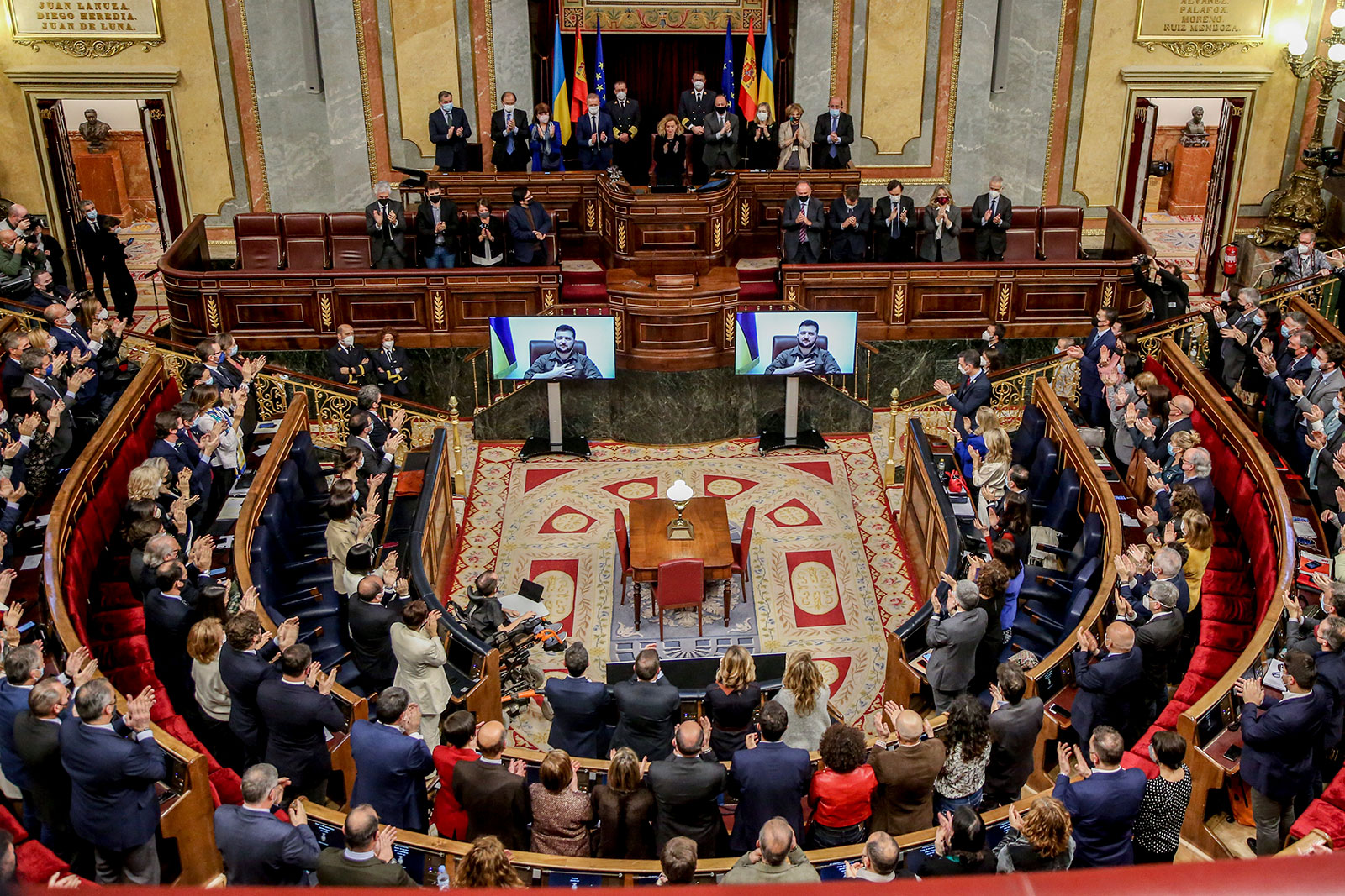 Attendees applaud the appearance of Ukrainian President Volodymyr Zelensky at the Spanish Parliament on April 5 in Madrid. 