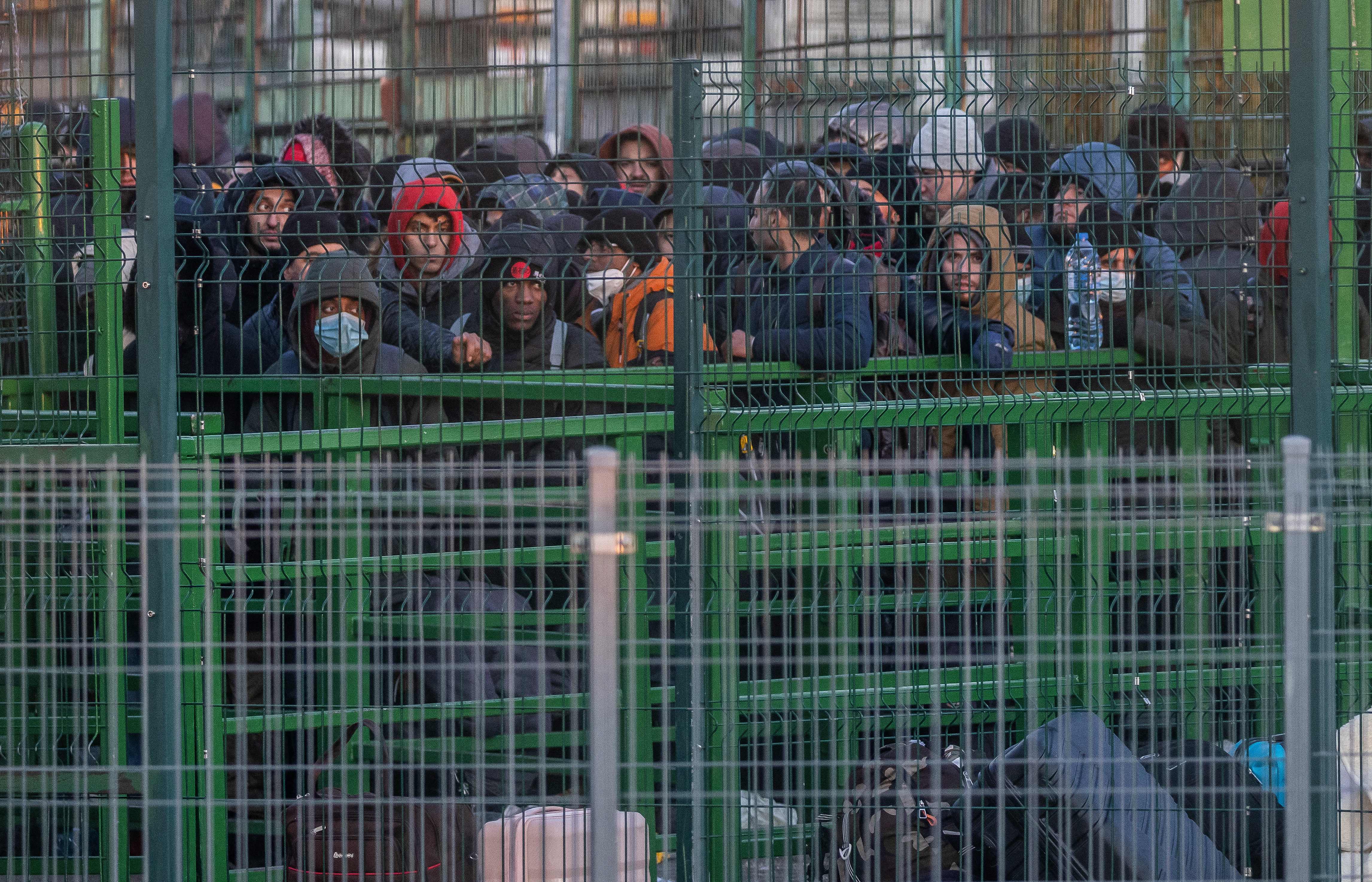 Refugees from Ukraine line up to get in to Poland at the border crossing in Medyka, Poland, on February 28.
