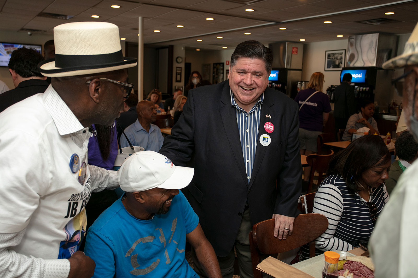Illinois Gov. JB Pritzker speaks to supporters on primary election day at Manny's Deli on June 28 in Chicago.