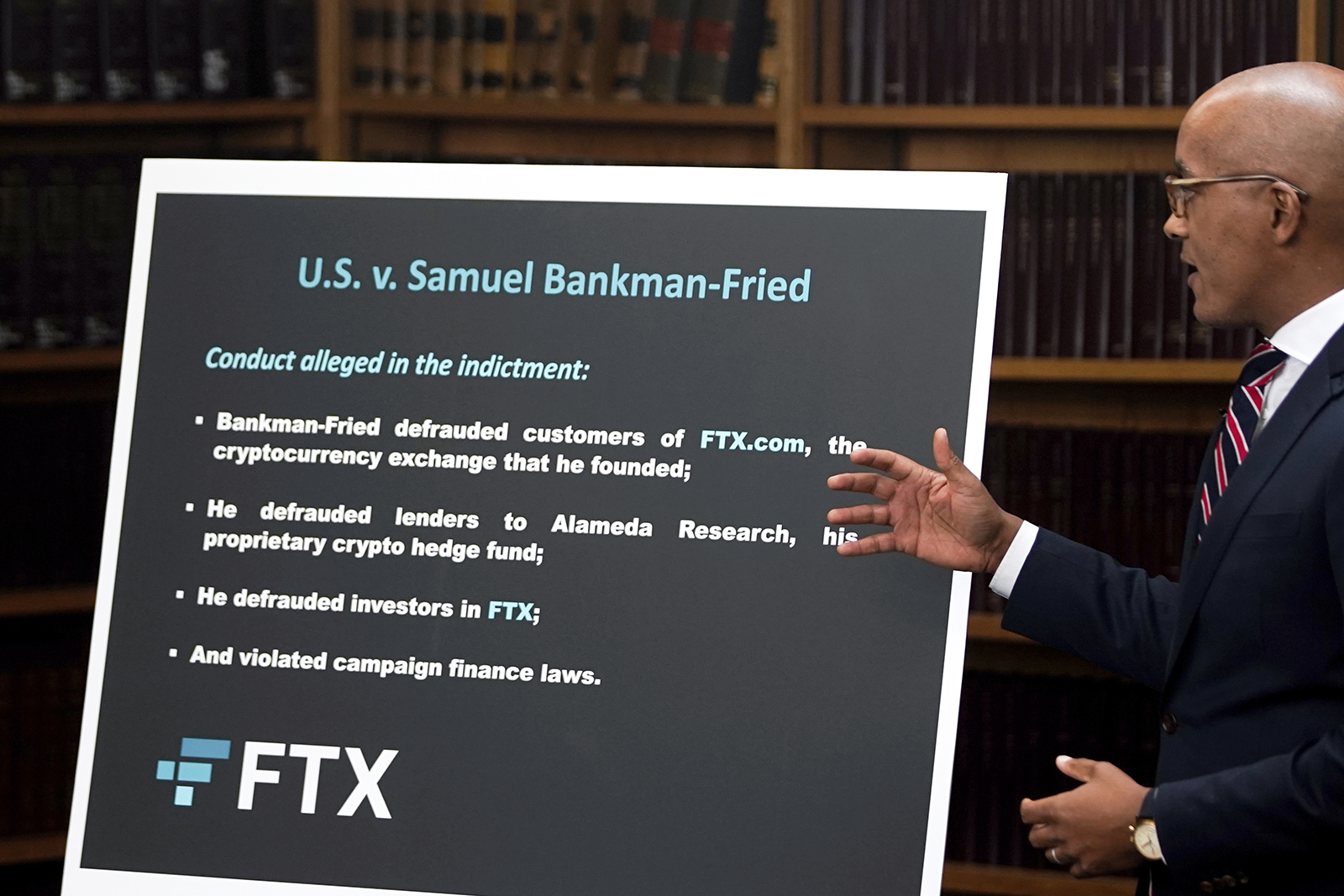 U.S. Attorney Damian Williams speaks during a news conference about the criminal charges filed against FTX founder Sam Bankman-Fried, today in New York. The U.S. Securities and Exchange Commission has charged the former CEO of failed cryptocurrency firm FTX with orchestrating a scheme to defraud investors. 
