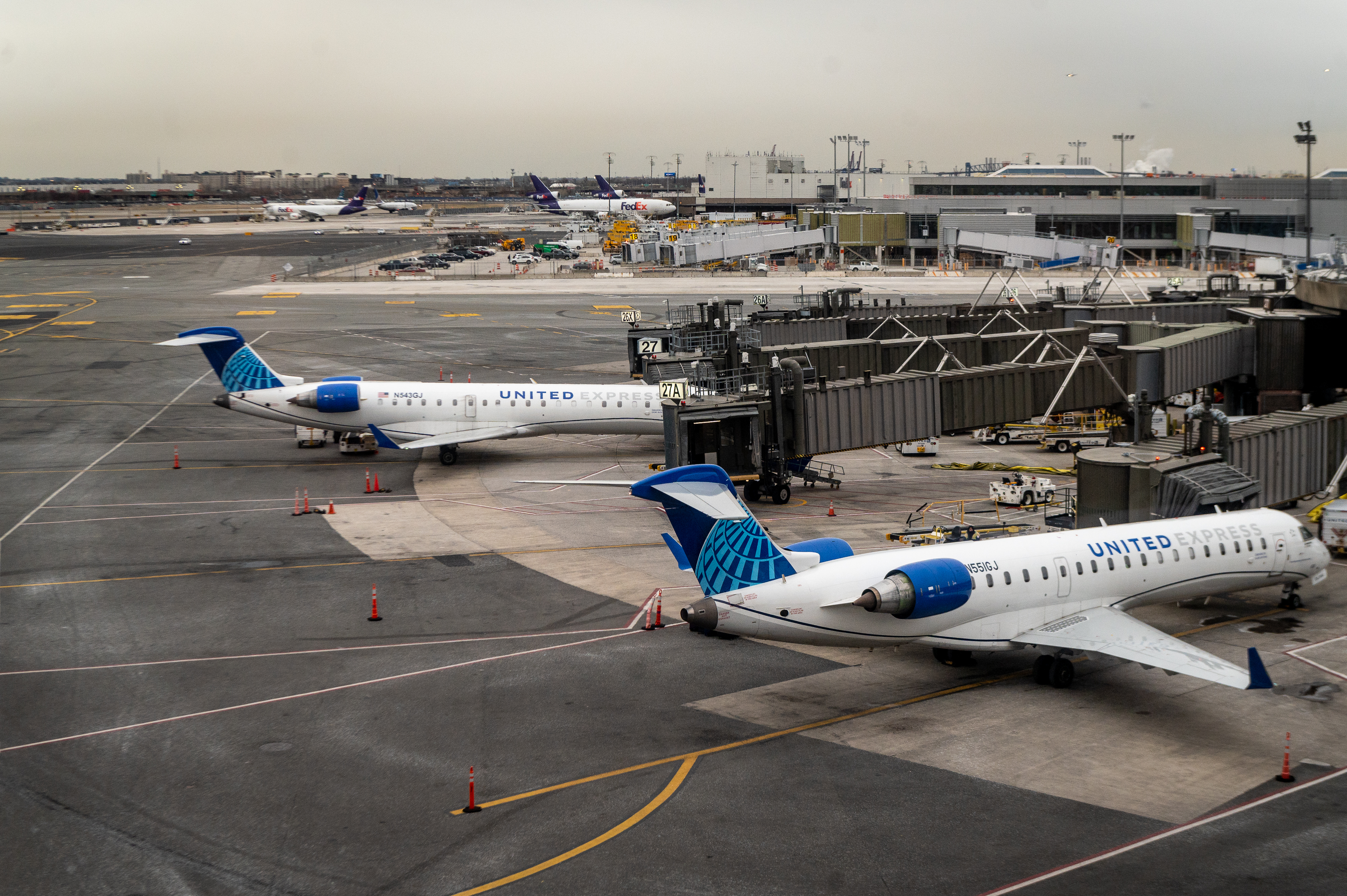 United Airlines airplanes on the tarmac at Newark Liberty International Airport (EWR) in Newark, New Jersey, U.S., on Monday, January. 3, 2022. 