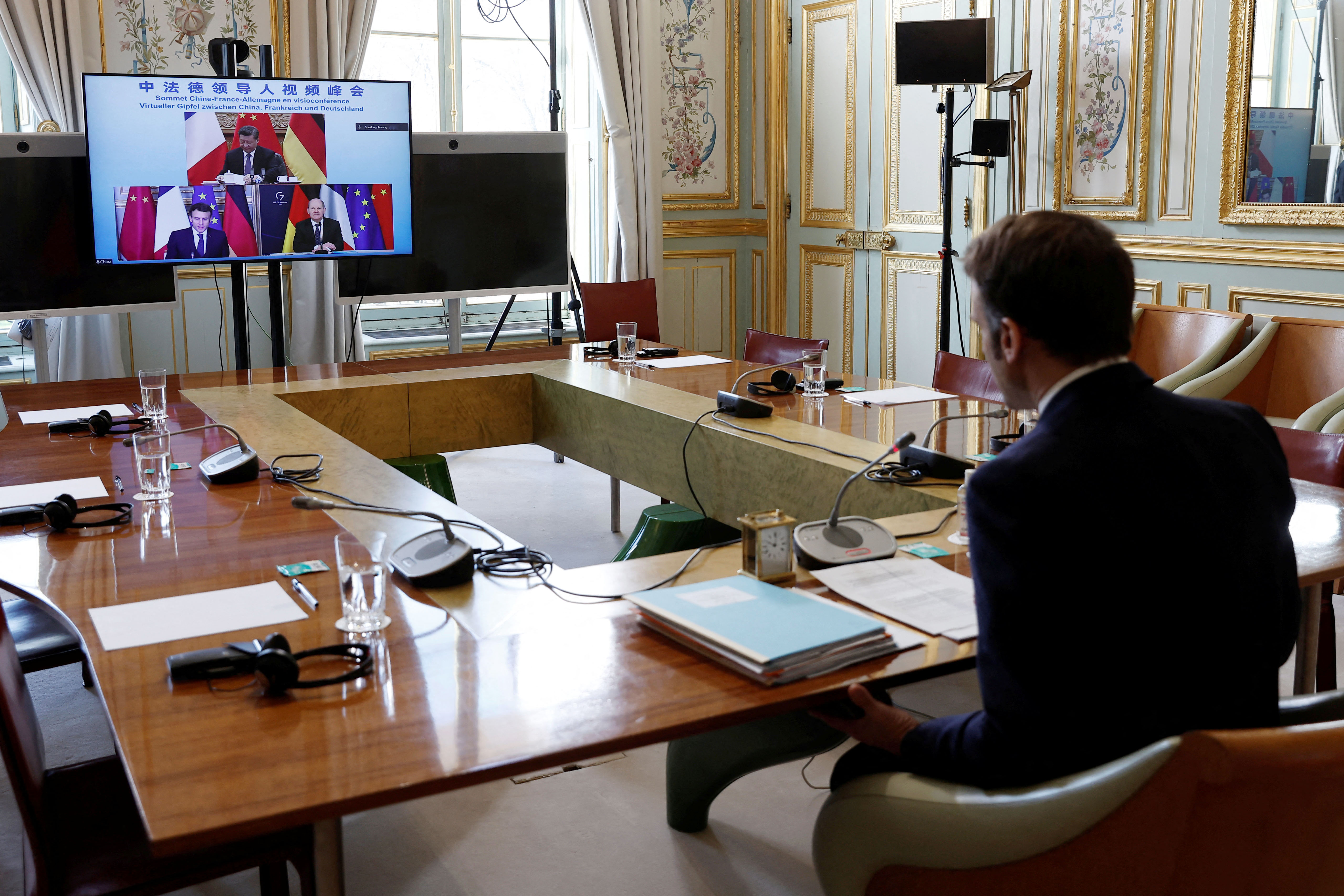 French President Emmanuel Macron attends a video-conference with German Chancellor Olaf Scholz and Chinese President Xi Jinping to discuss the Ukraine crisis, at the Elysee Palace, Paris, France, on March 8.