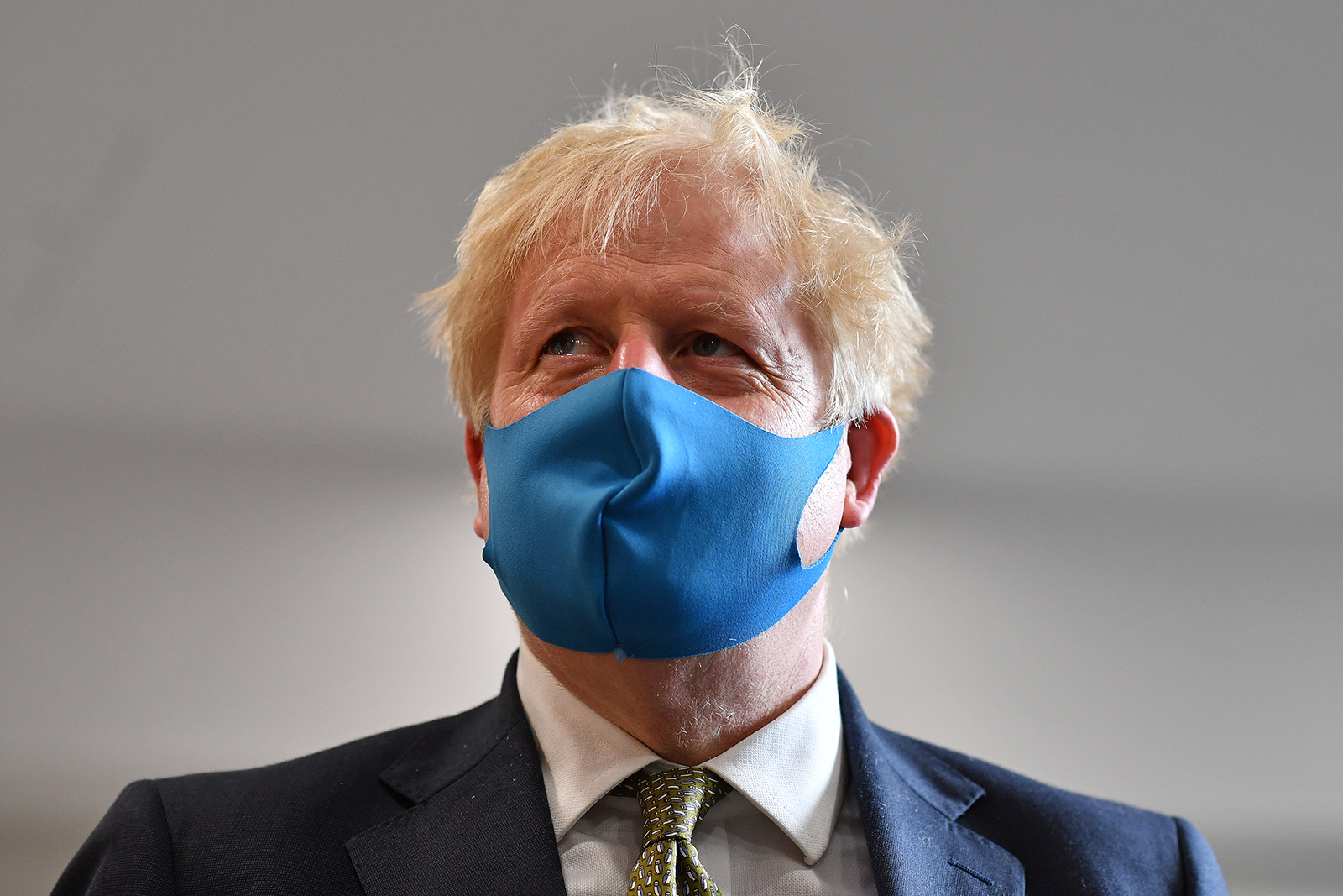 Britain's Prime Minister Boris Johnson, wearing a face mask in London on July 13.