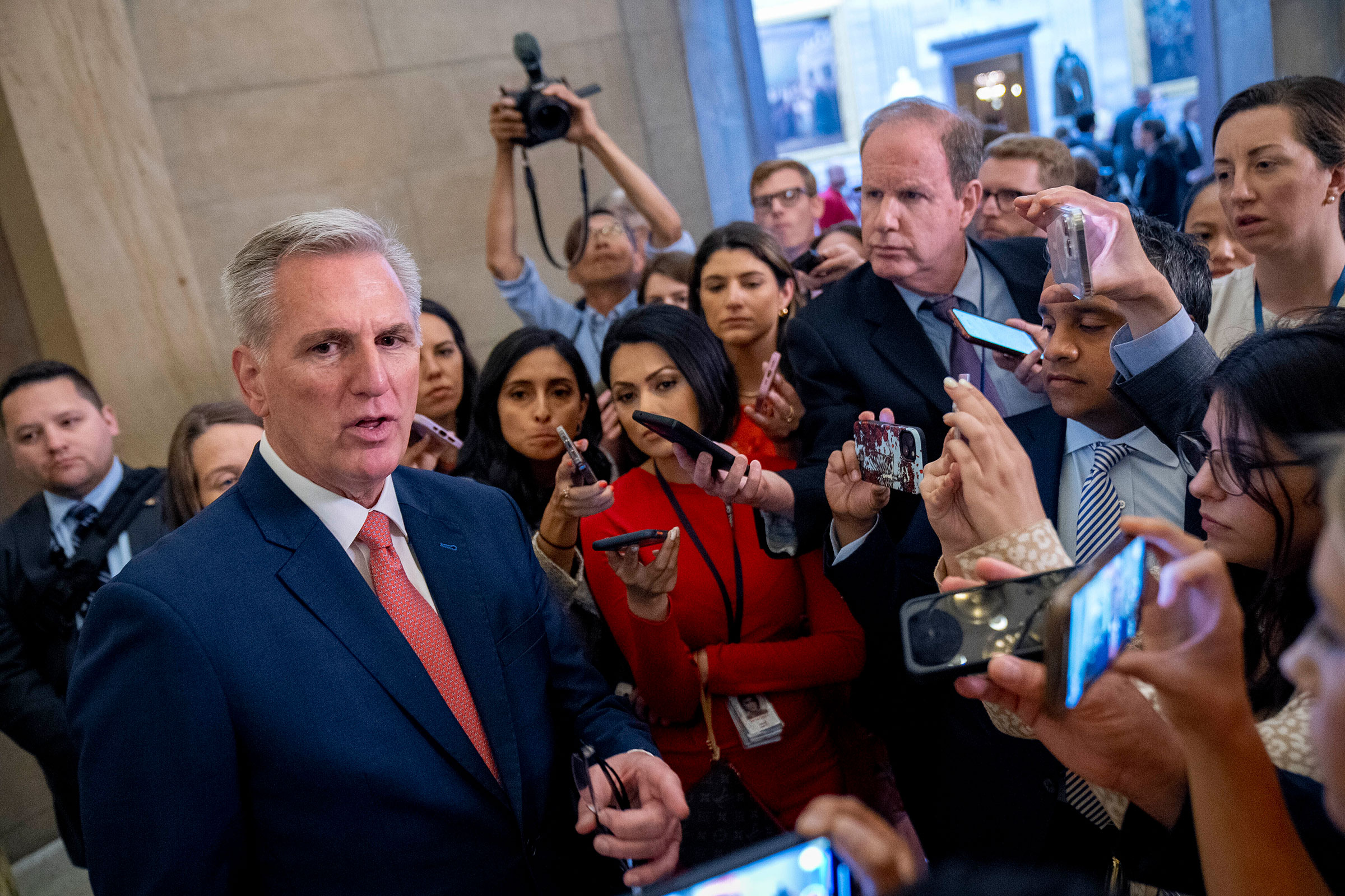 House Speaker Kevin McCarthy speaks to reporters outside his office on Capitol Hill in Washington, June 7. 