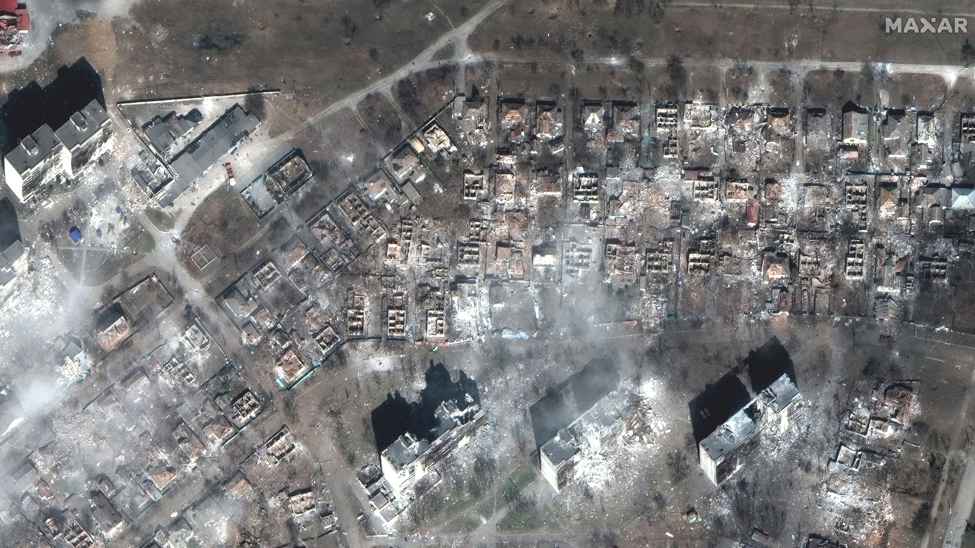 A satellite image provided by Maxar Technologies shows damaged apartment buildings and homes in Mariupol, Ukraine, Tuesday, March 29.
