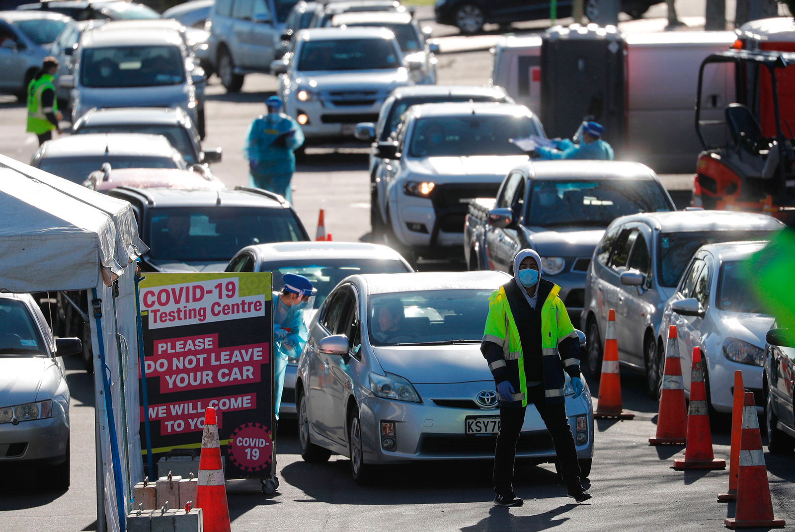Cars queue at a Covid-19 test center in Auckland, New Zealand, on August 13.