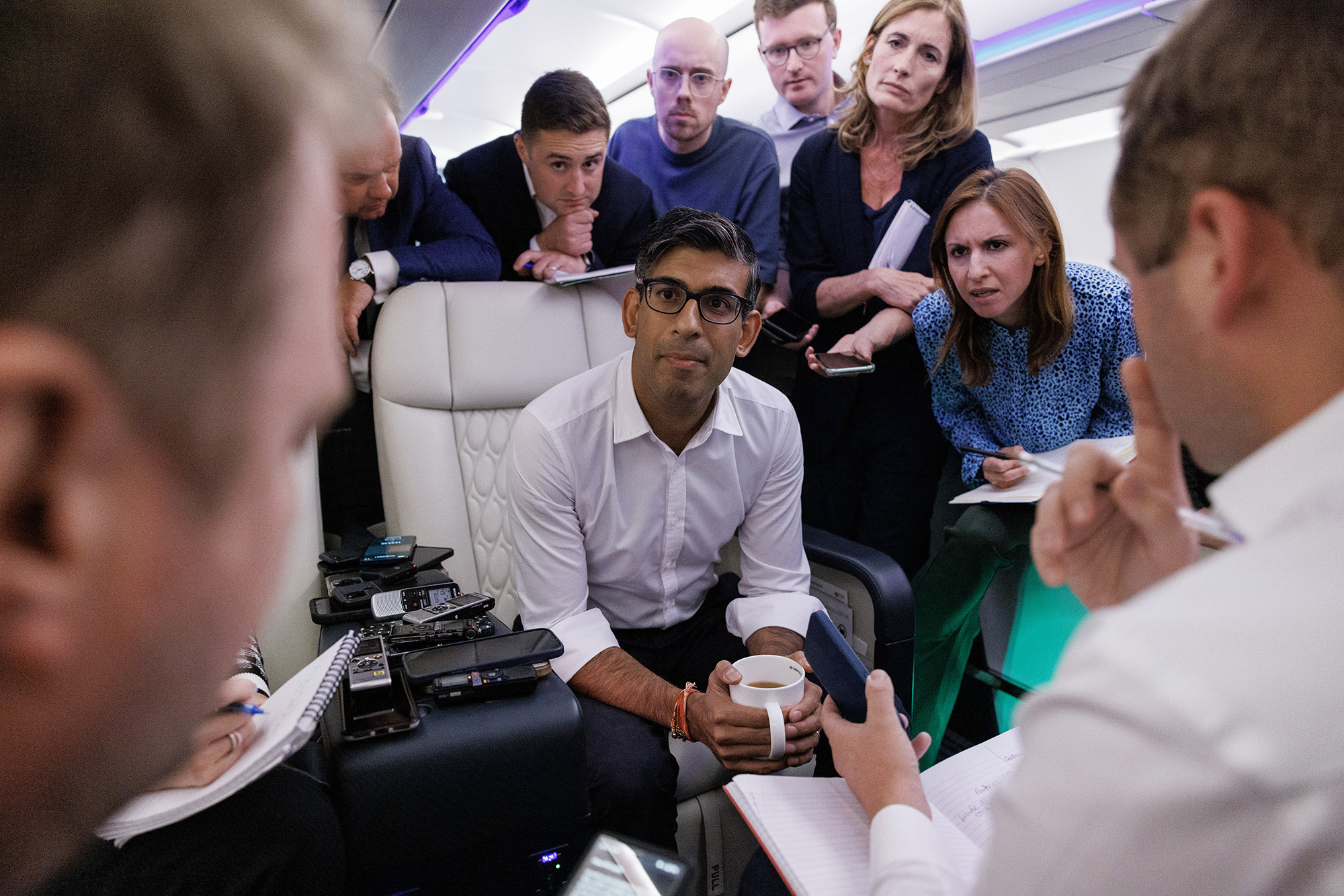 British Prime Minister Rishi Sunak speaks with journalists onboard the Voyager aircraft as he travels to India for the G20 Summit on September 7.