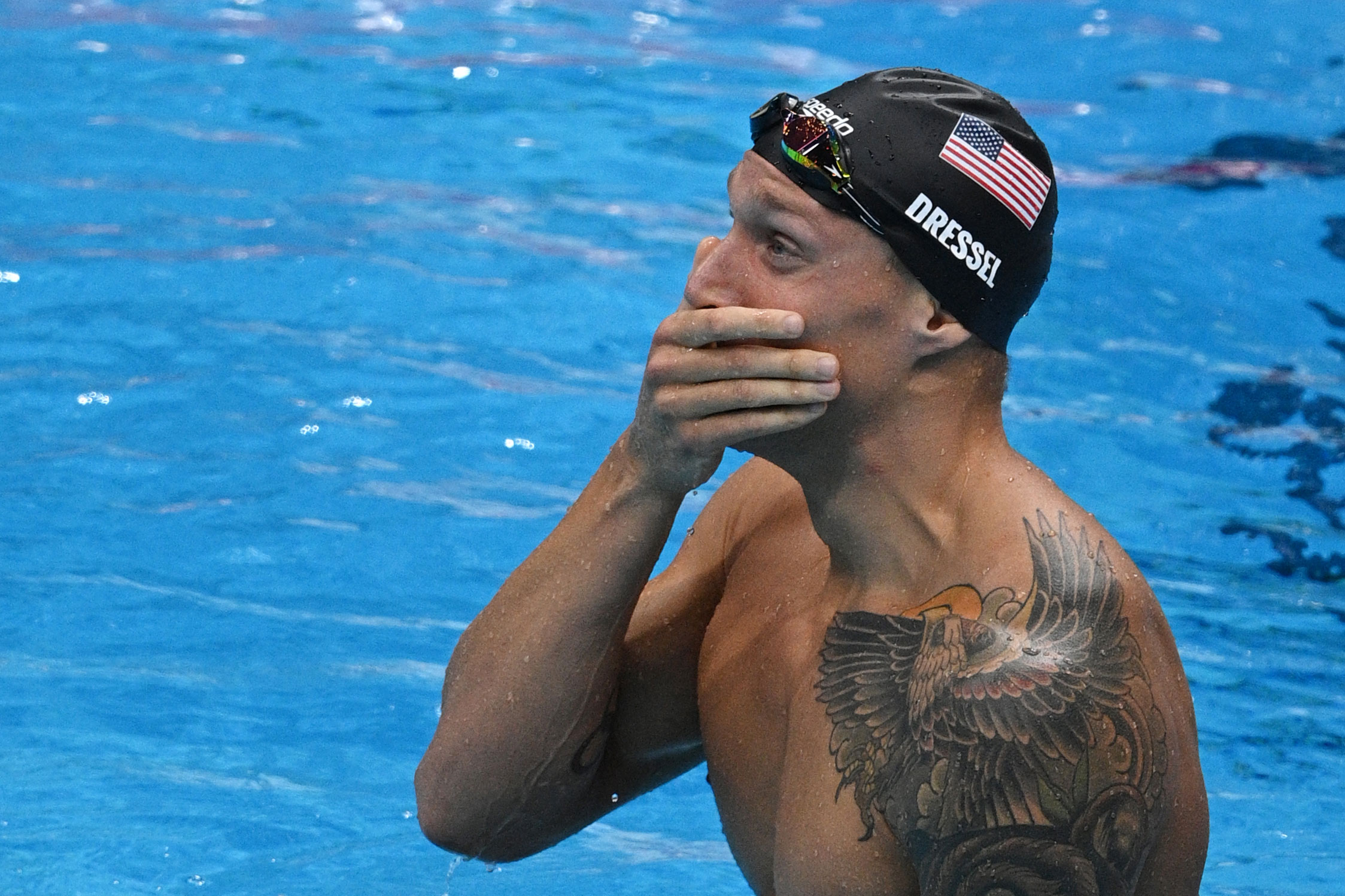 The United States' Caeleb Dressel reacts to winning gold in the 100-meter freestyle on July 29.