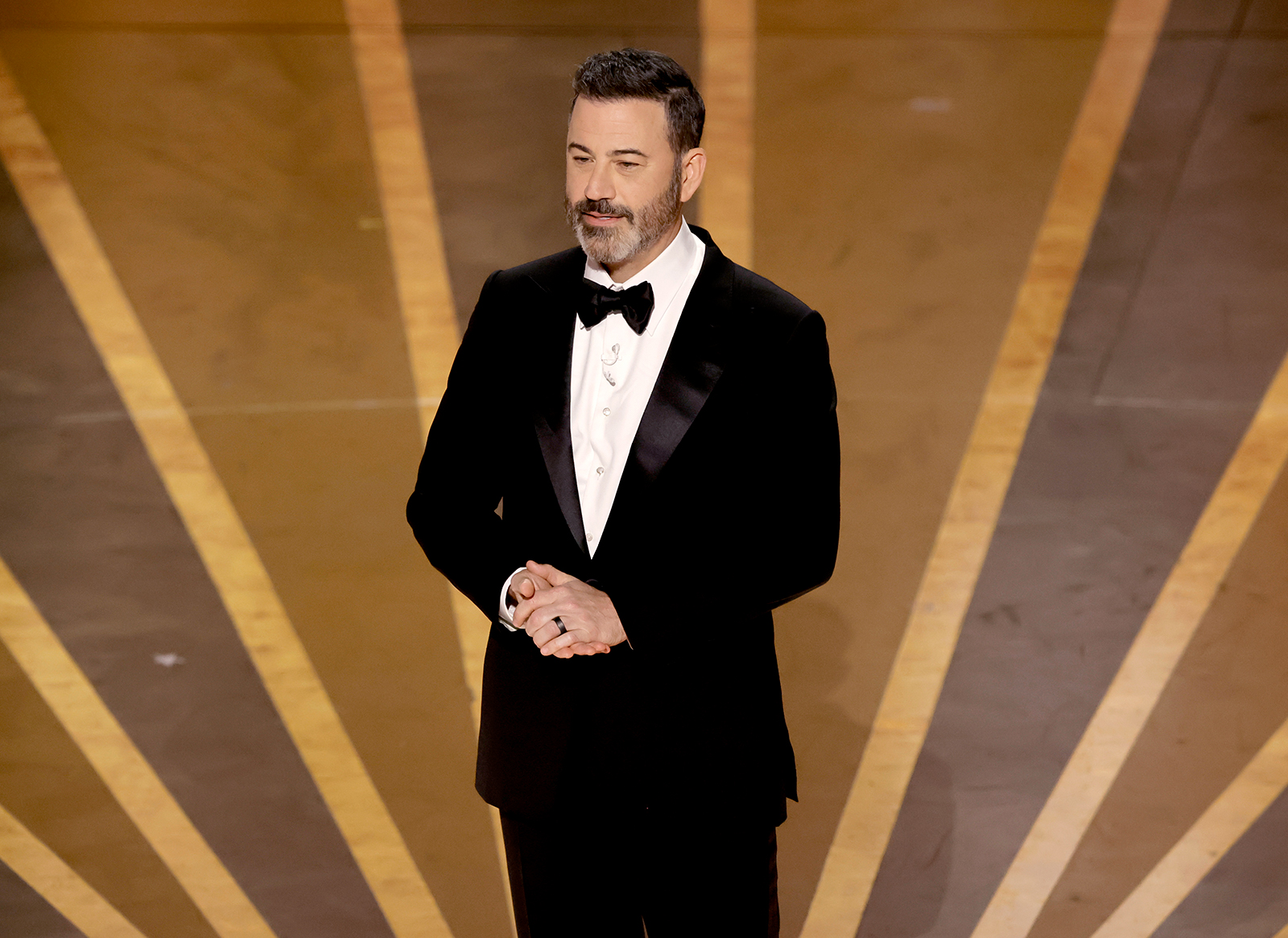 Host Jimmy Kimmel speaks onstage. 