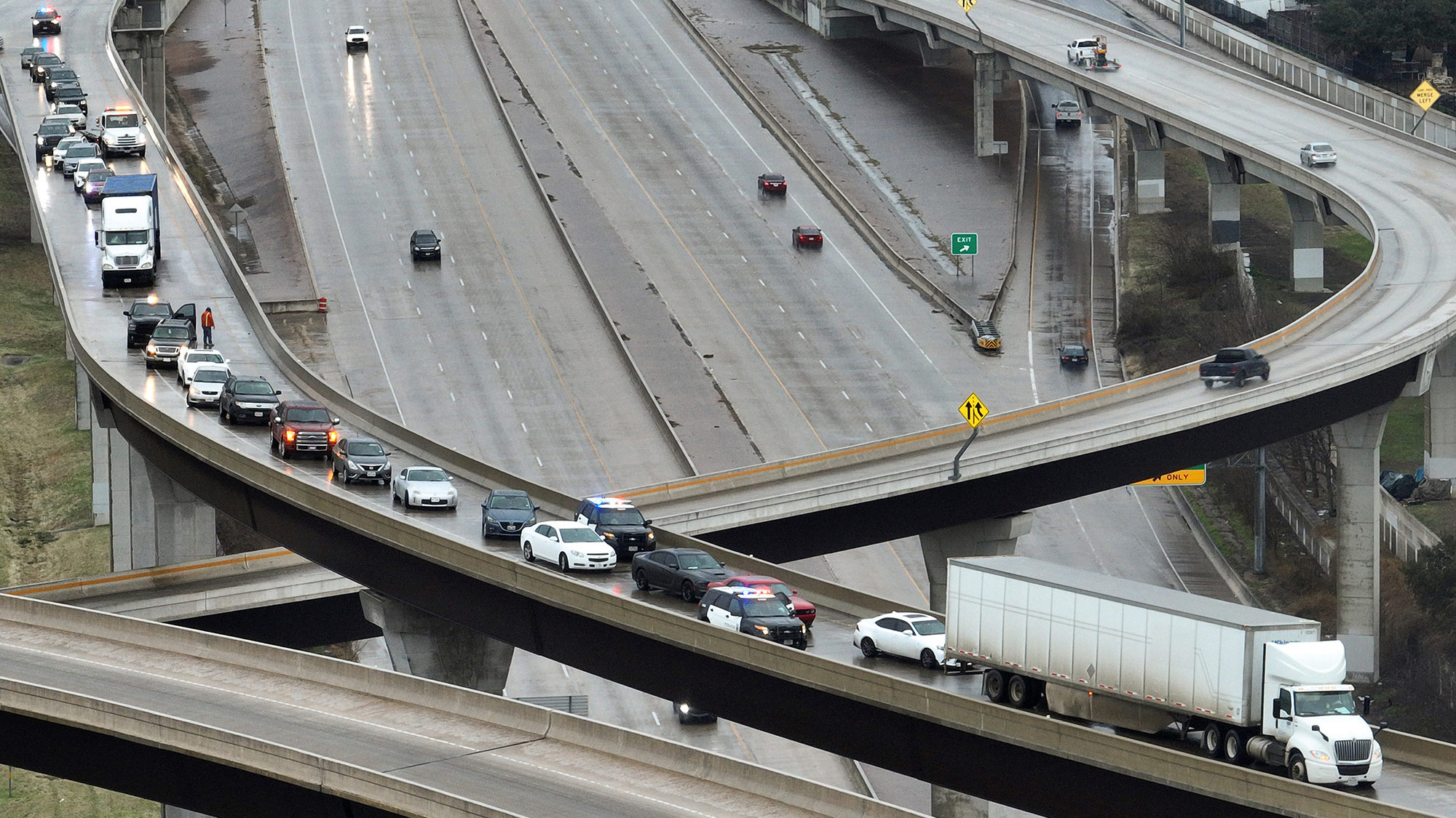Cars are stuck on an icy highway in Austin, Texas, on January 31. 