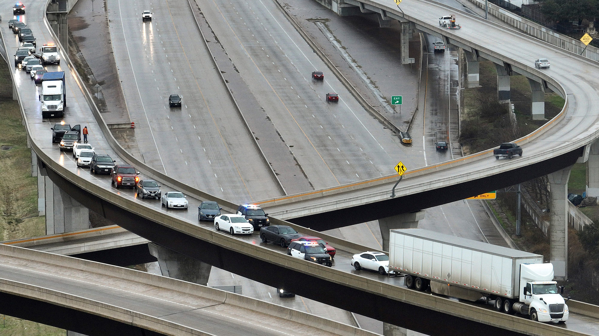 Cars are stuck on an icy highway in Austin, Texas, on January 31.