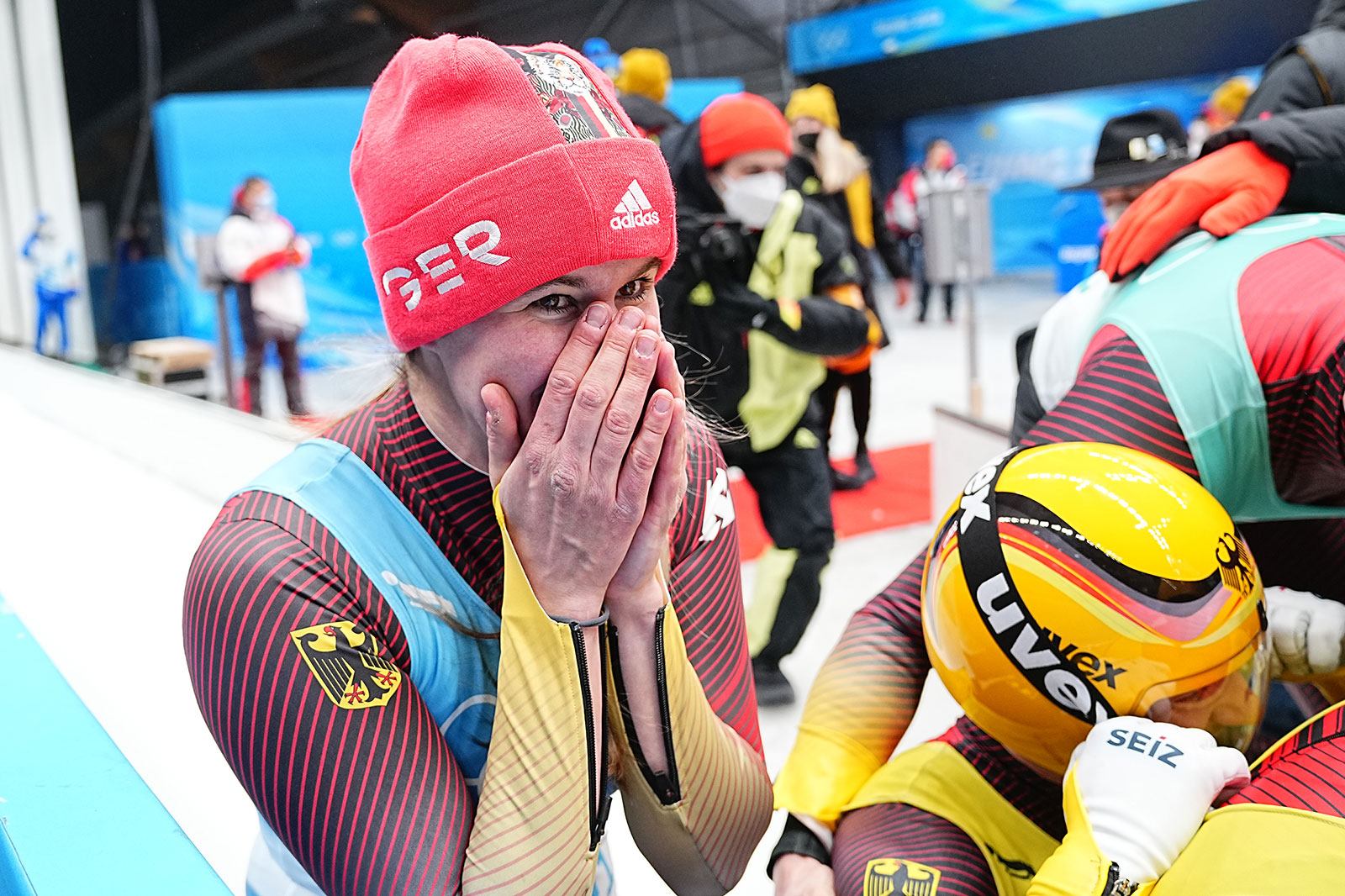 Germany's Natalie Geisenberger celebrates winning the team luge competition with her teammates on February 10.