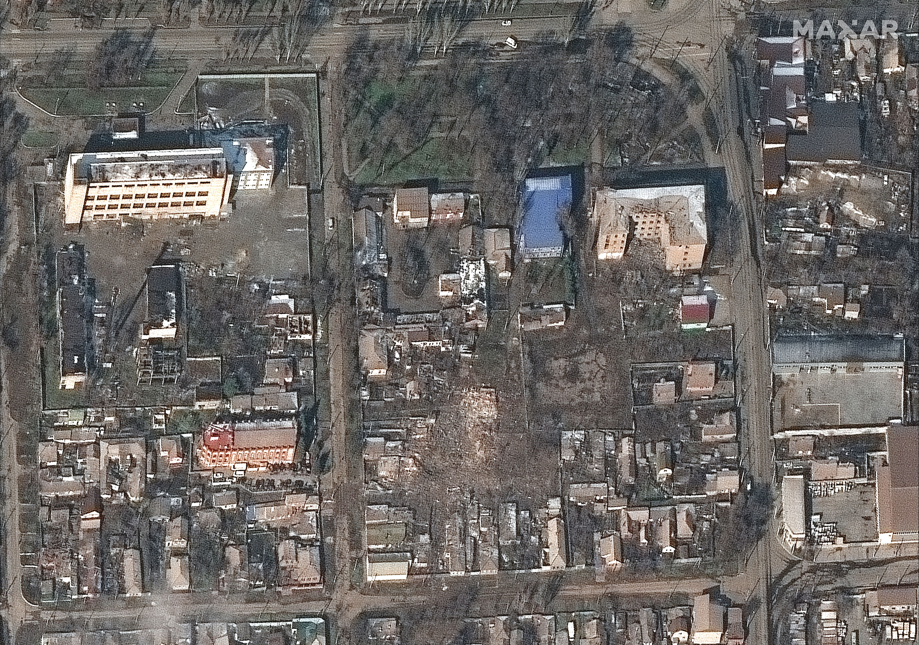 The same buildings and homes in central Mariupol are seen in this image taken March 9, 2022.