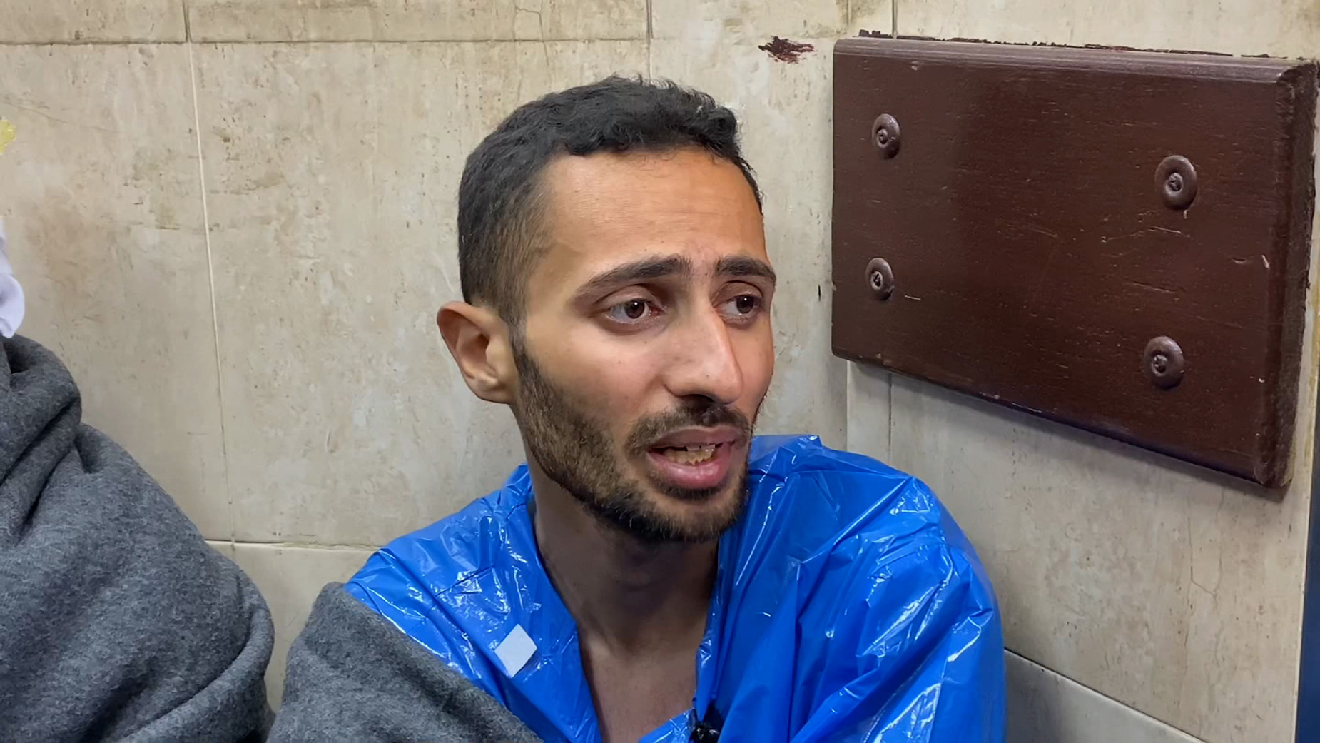 Mohammad Mershid, 25, pictured in Al-Aqsa Martyrs Hospital, in central Gaza, says he was detained and tortured by the Israeli military, during an ongoing raid near Al-Shifa Hospital, in the north.