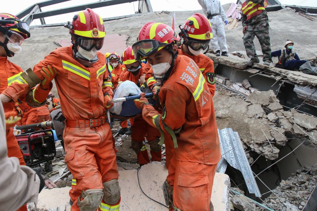 Emergency workers conducting search and rescue after a hotel collapsed in Quanzhou, in China's eastern Fujian province on March 8.
