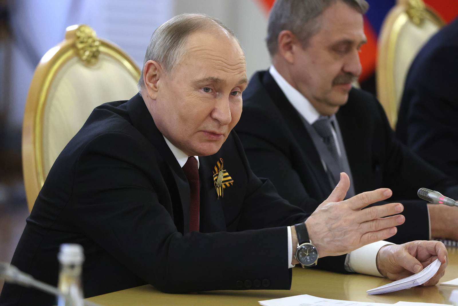 Vladimir Putin attends a meeting at the Grand Kremlin Palace in Moscow, Russia, on May 9.