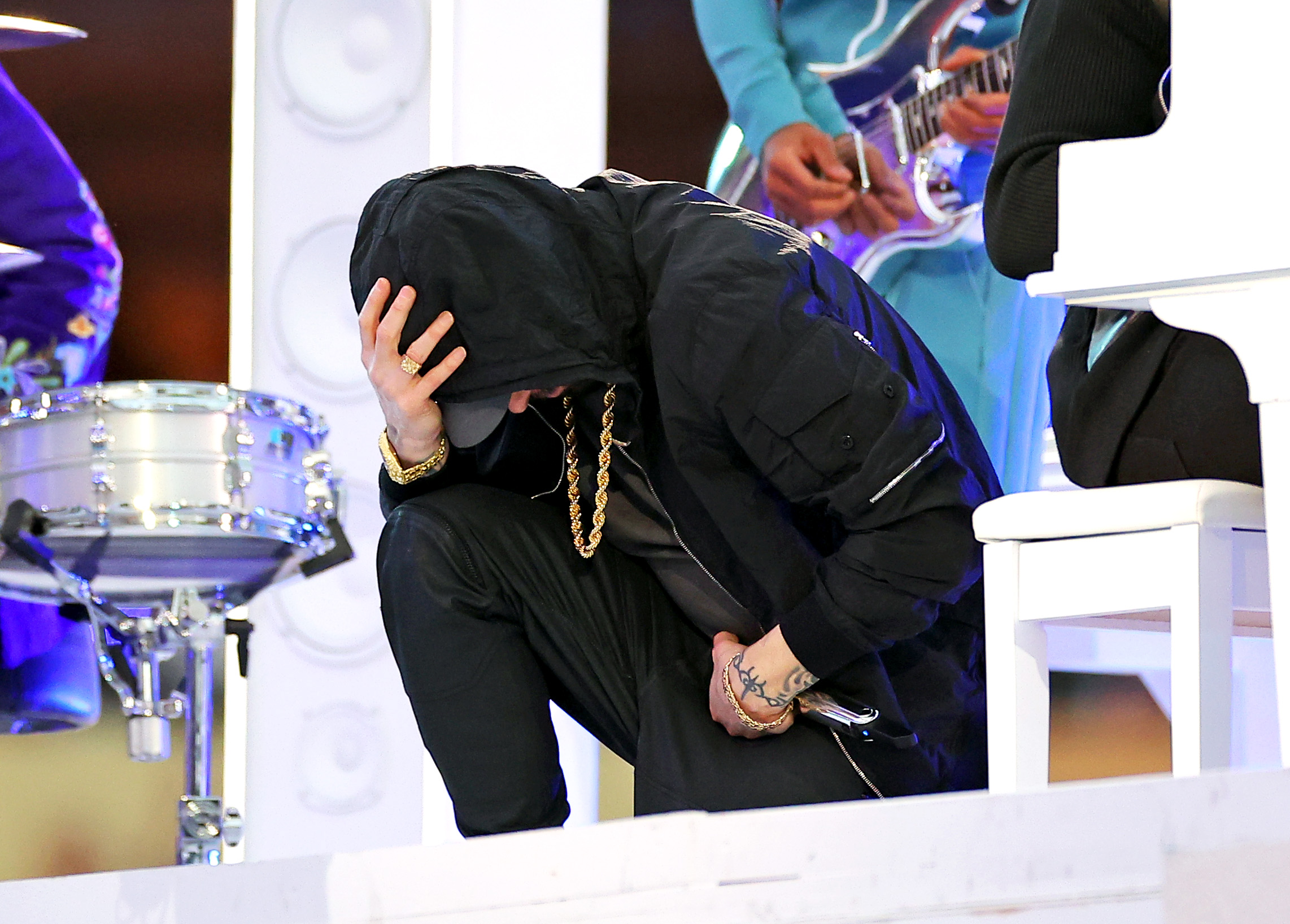 Eminem takes a knee