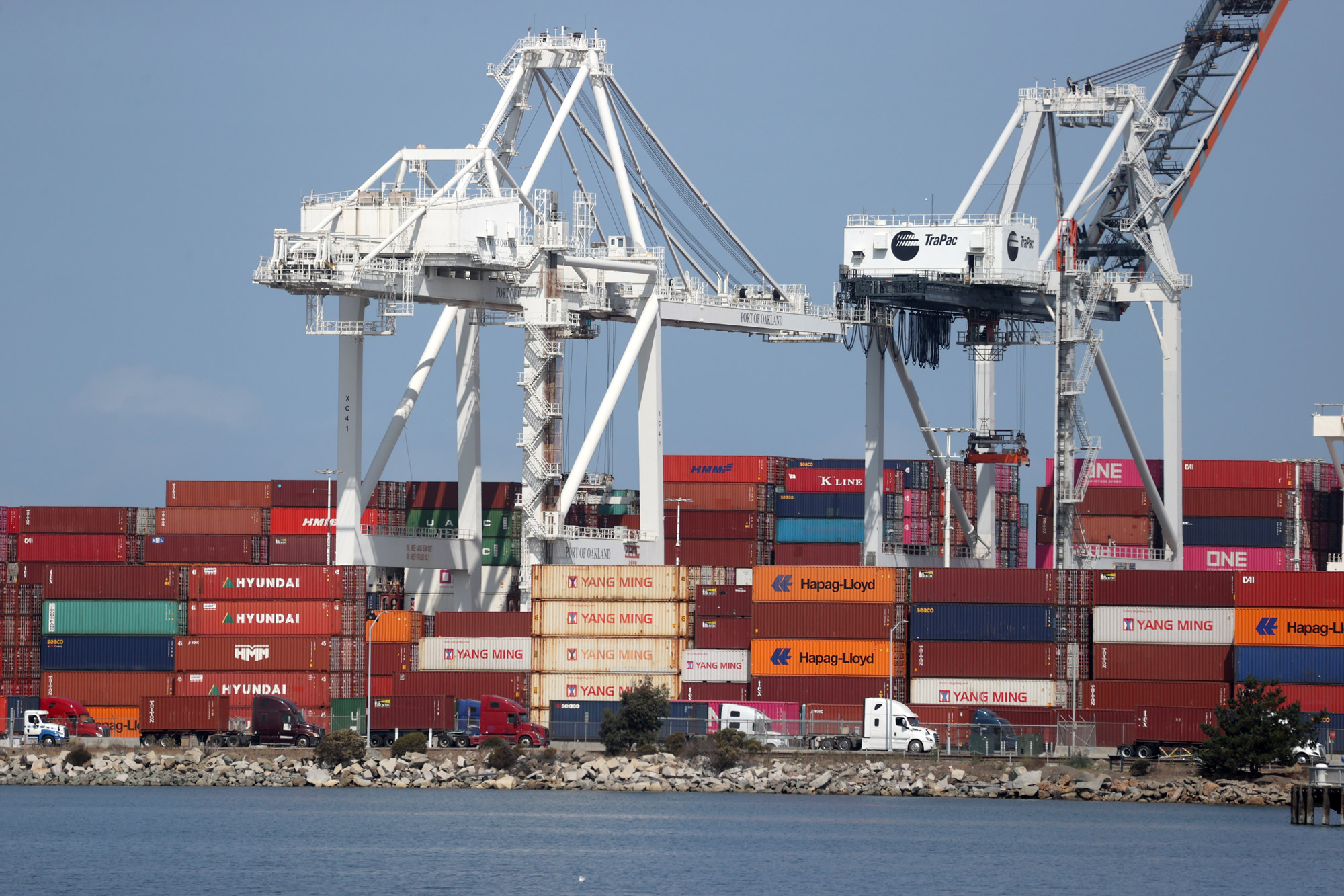 Shipping containers sit on the dock at the Port of Oakland on September 18 in Oakland, California.