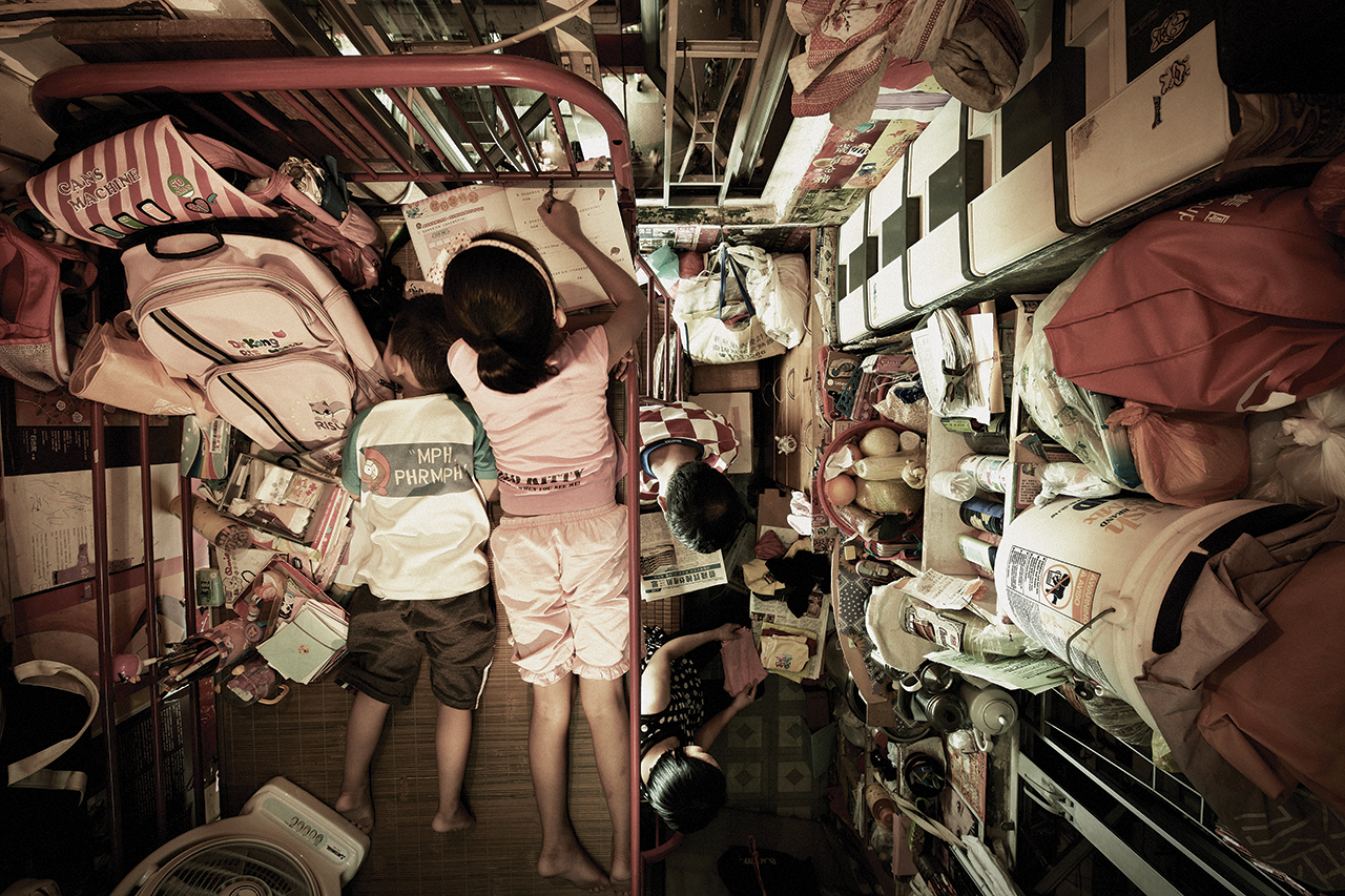 A handout photograph from the Society for Community Organization shows the inside of one of Hong Kong's "cage homes." 