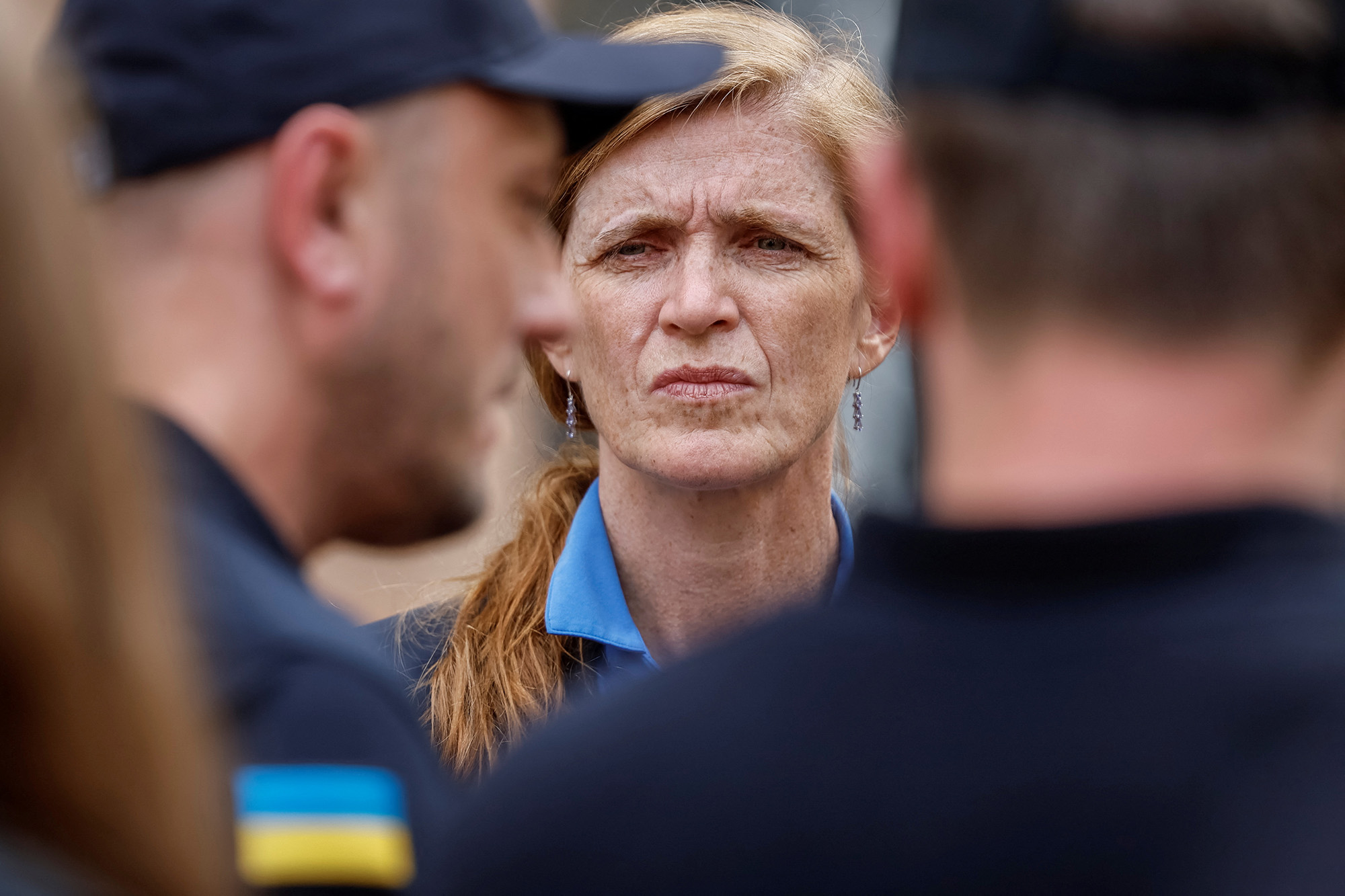 United States Agency for International Development Administrator Samantha Power looks on while talking with Ukrainian rescuers during a visit to Kyiv, Ukraine, on July 17.