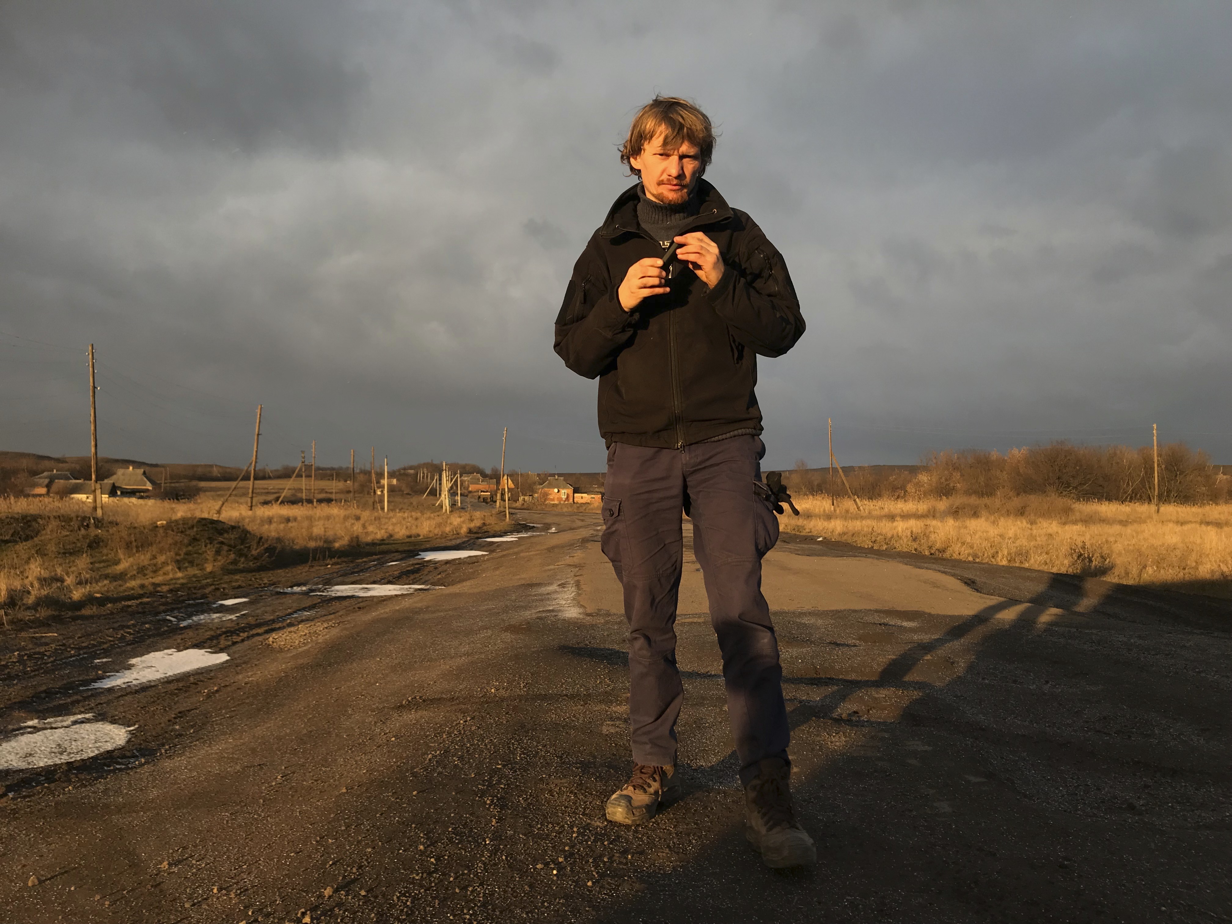Ukrainian photojournalist Maksym Levin poses for a photo in Donetsk region, Ukraine on January 12, 2018. 