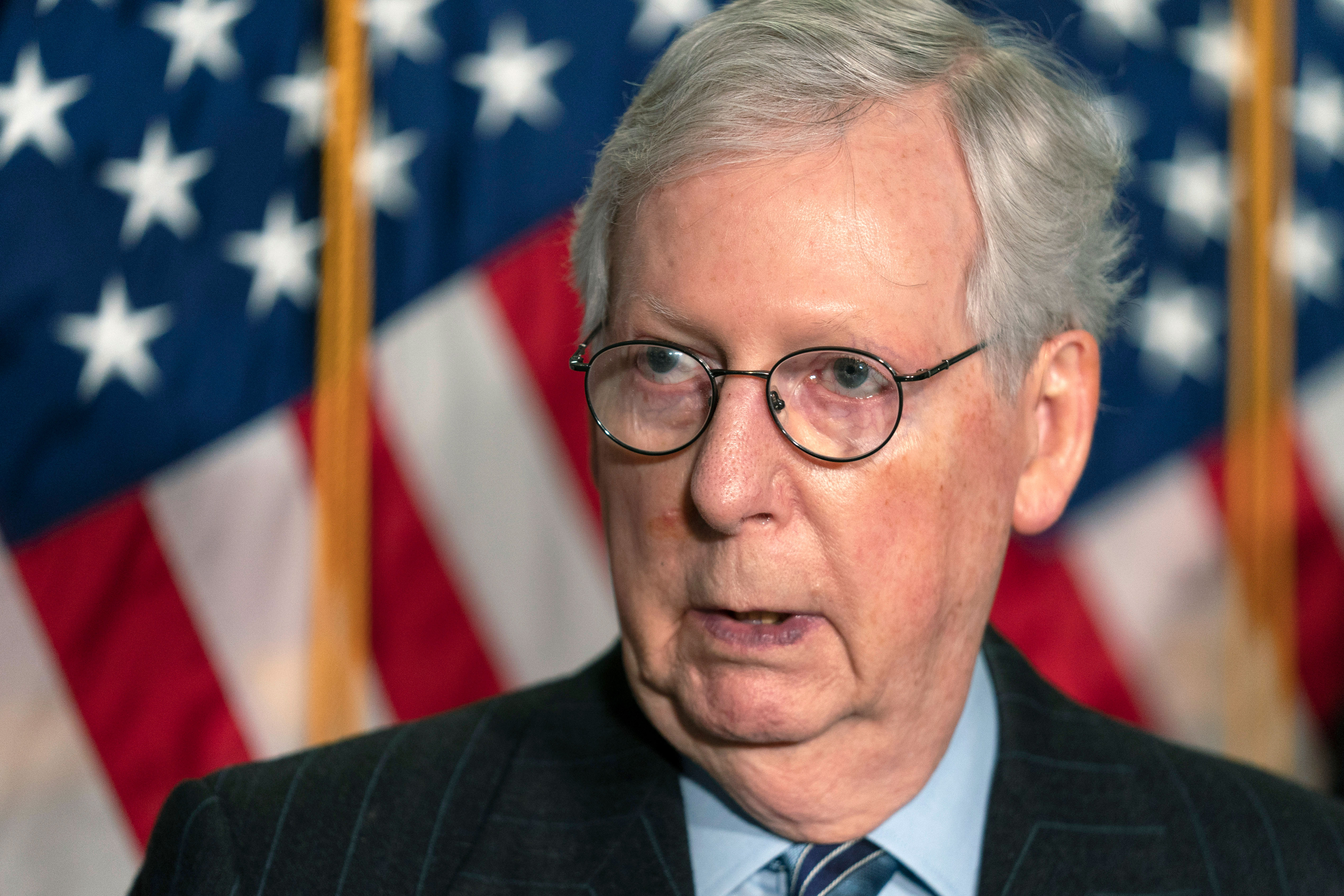 Senate Minority Leader Mitch McConnell speaks to reporters at the Capitol on February 2.