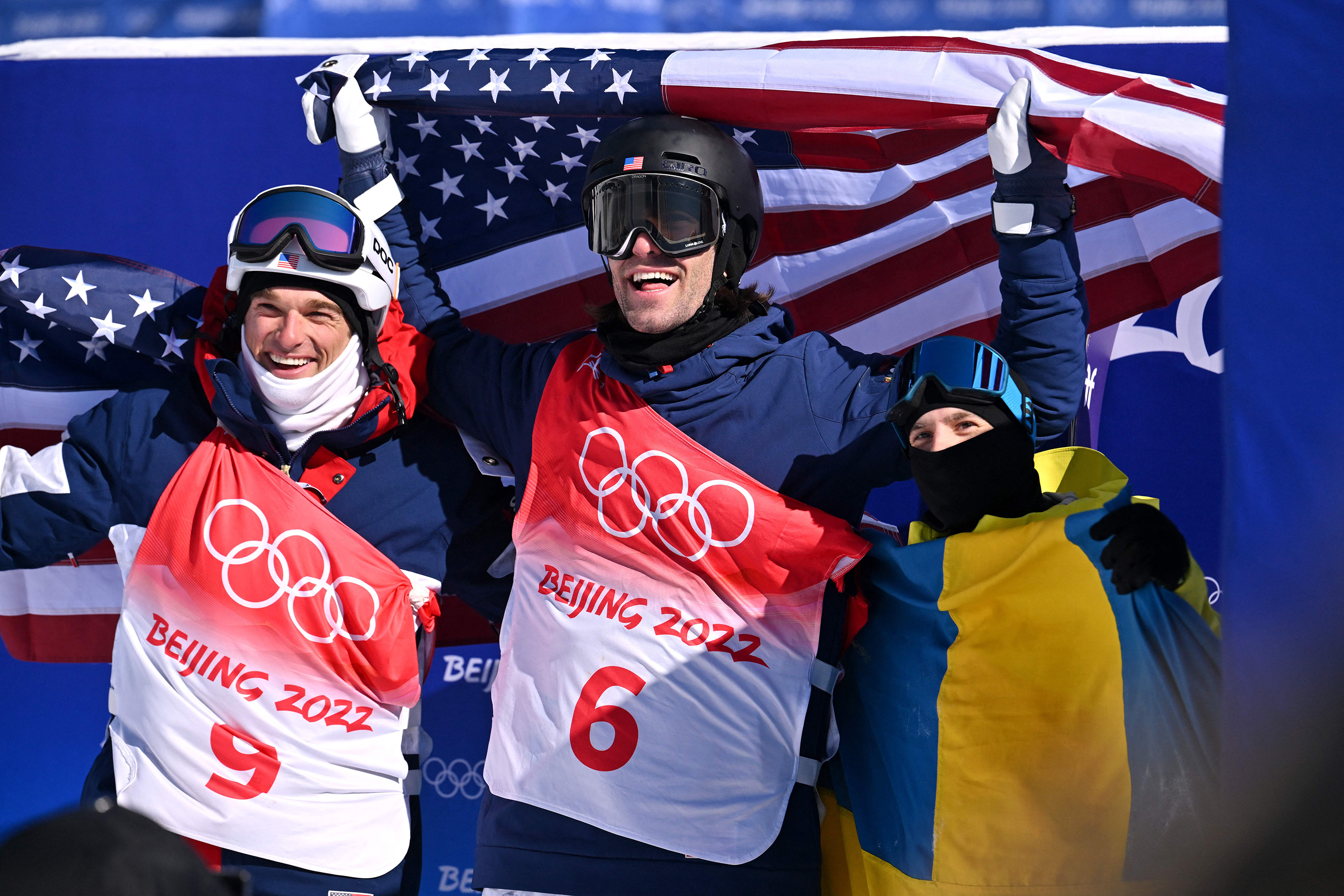 Silver medallist USA's Nicholas Goepper, gold medallist USA's Alexander Hall and bronze medallist Sweden's Jesper Tjader pose after the freestyle skiing men's freeski slopestyle final run on Wednesday.