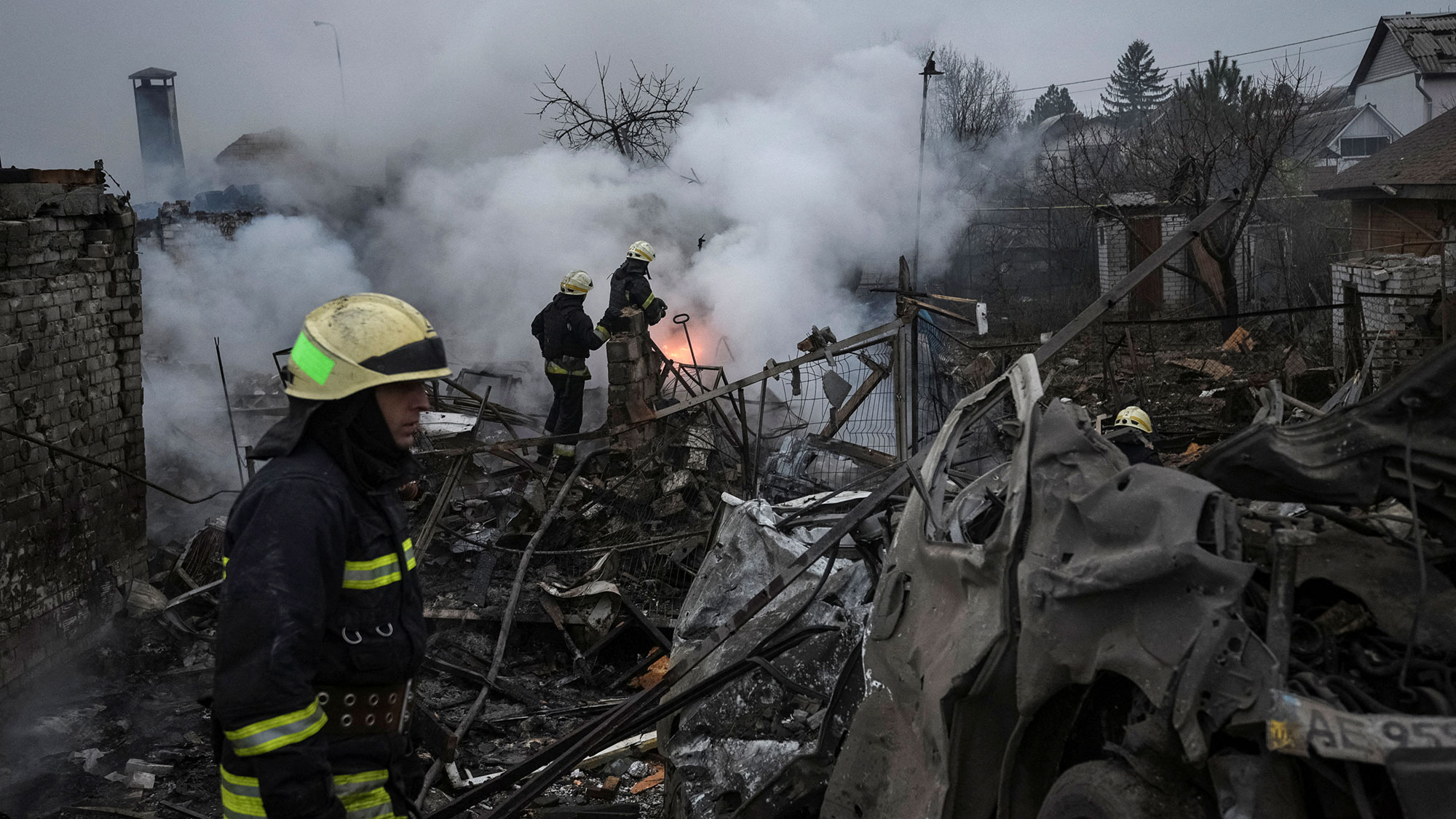 Rescuers work the site of an attack in Dnipro, Ukraine, on November 26. 