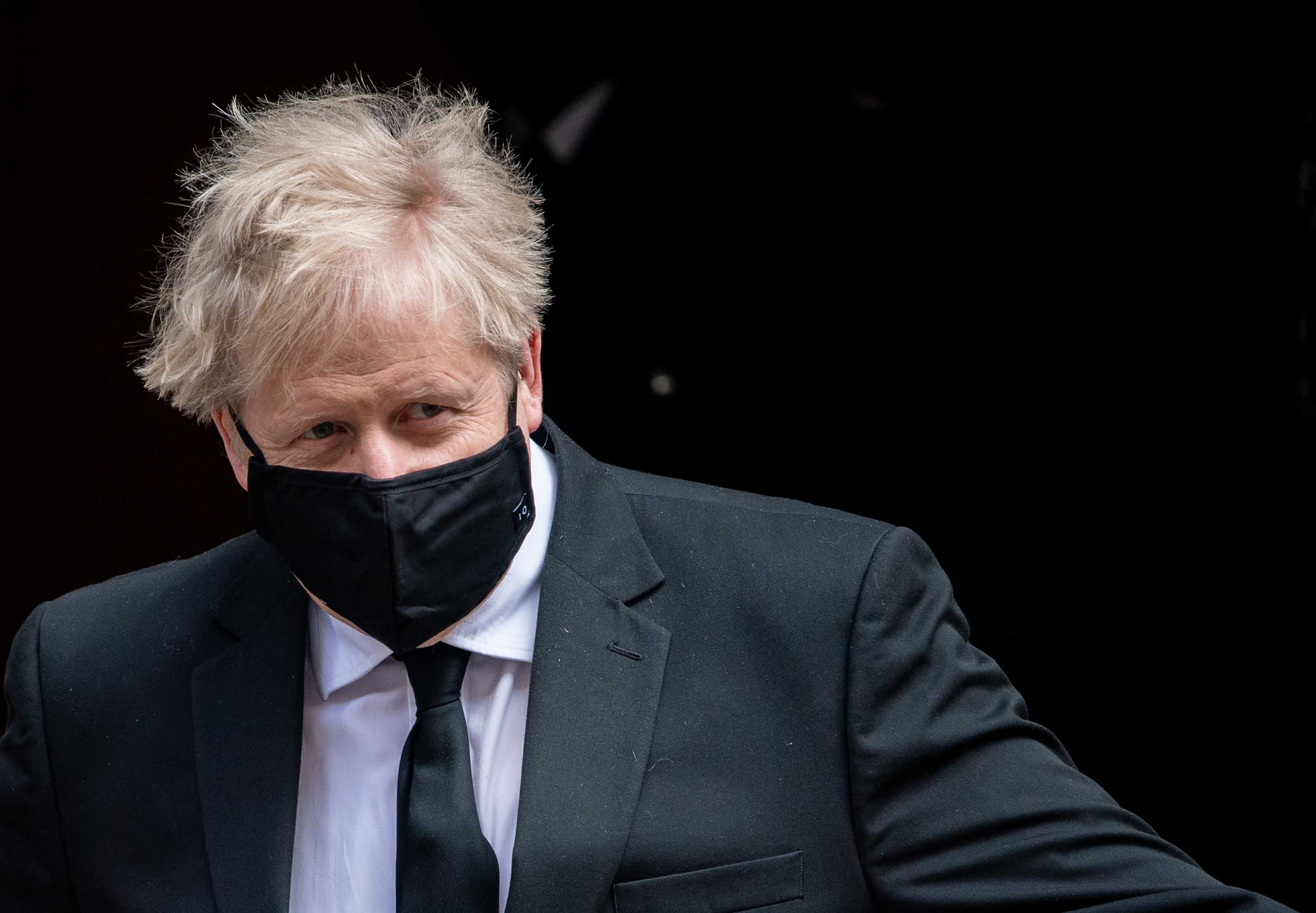 British Prime Minister Boris Johnson is pictured leaving Downing Street on April 14, in London. 