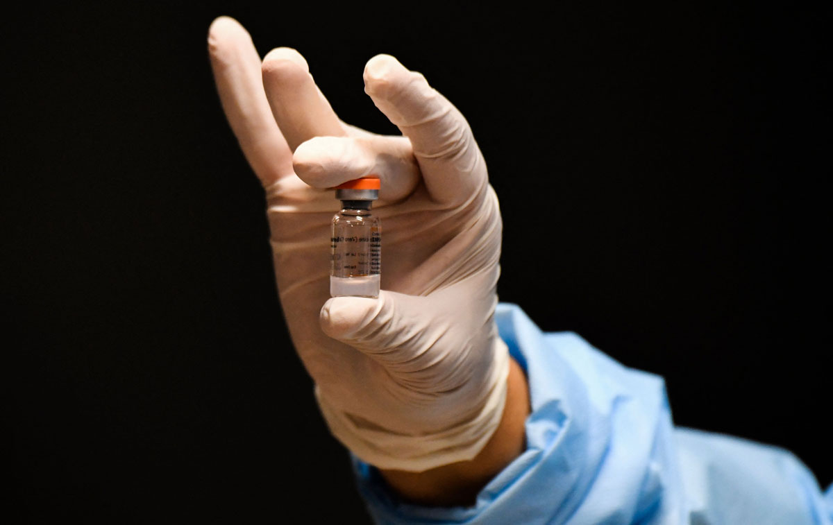 A nurse holds a vial of China's Sinovac vaccine in Bogota, Colombia on March 9.