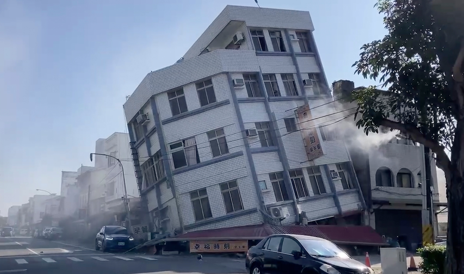 In this image taken from a video footage run by TVBS, a partially collapsed building is seen in Hualien, eastern Taiwan on Wednesday, April 3.