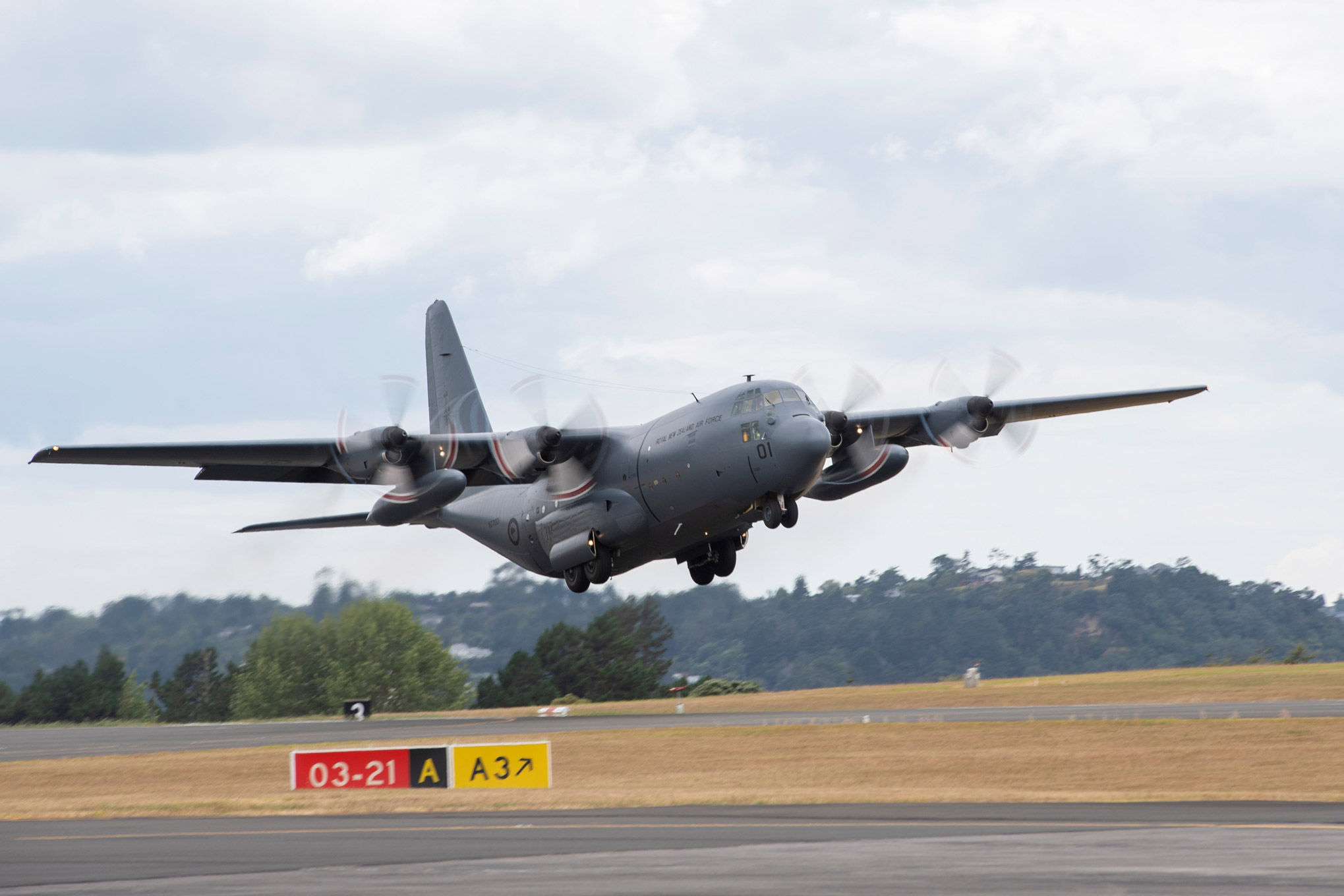In this file photo from Jan. 20, 2022, , a Royal New Zealand Air Force C-130 Hercules is seen taking off from Auckland, New Zealand, to deliver humanitarian aid and disaster relief supplies to Tonga.