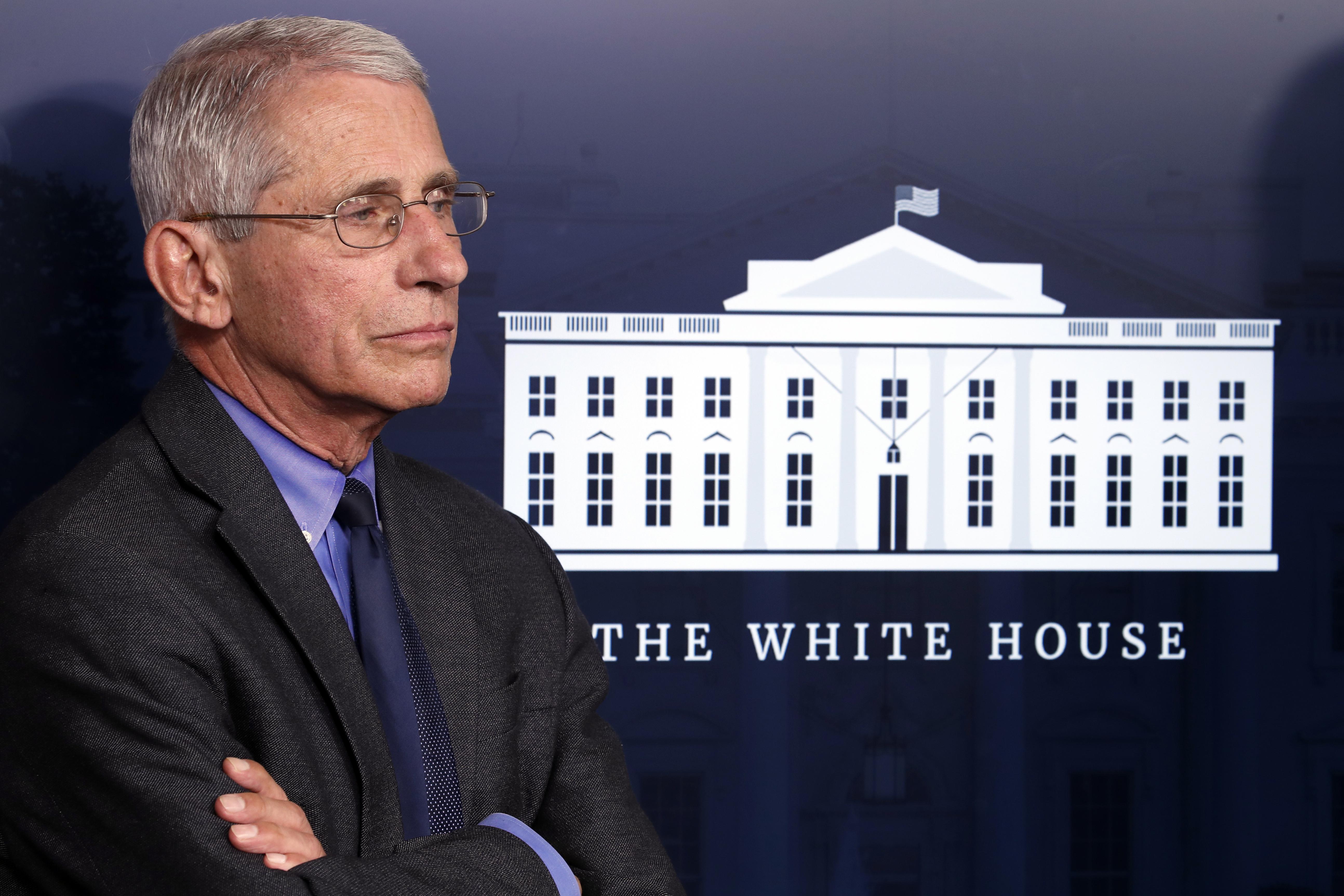 Dr. Anthony Fauci, director of the National Institute of Allergy and Infectious Diseases, listens during a briefing about the coronavirus at the White House on April 7.