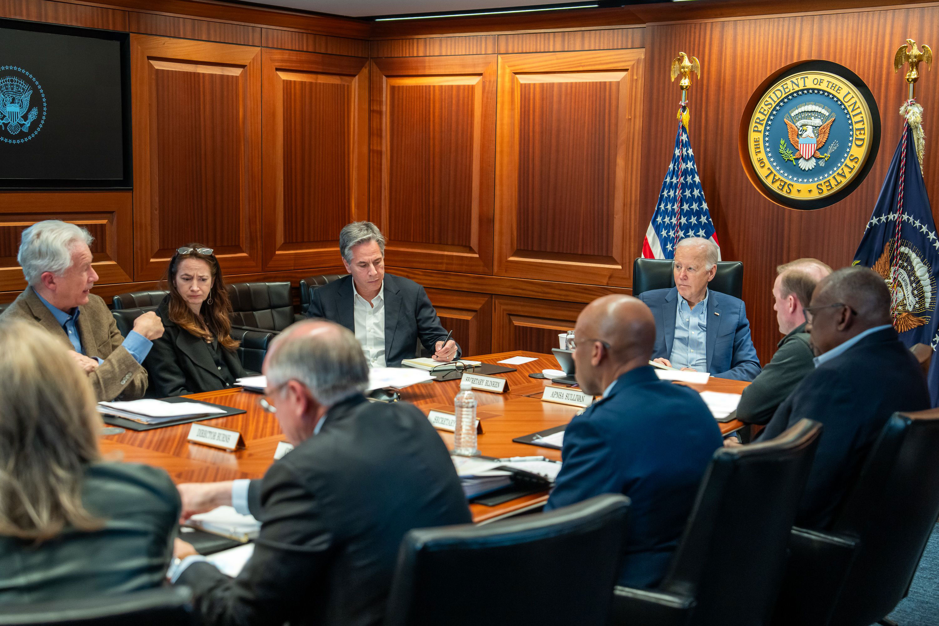 President Joe Biden meets with members of the National Security team regarding the unfolding missile attacks on Israel from Iran on Saturday in the White House Situation Room. Some portions of this handout photo have been blurred by the source. 