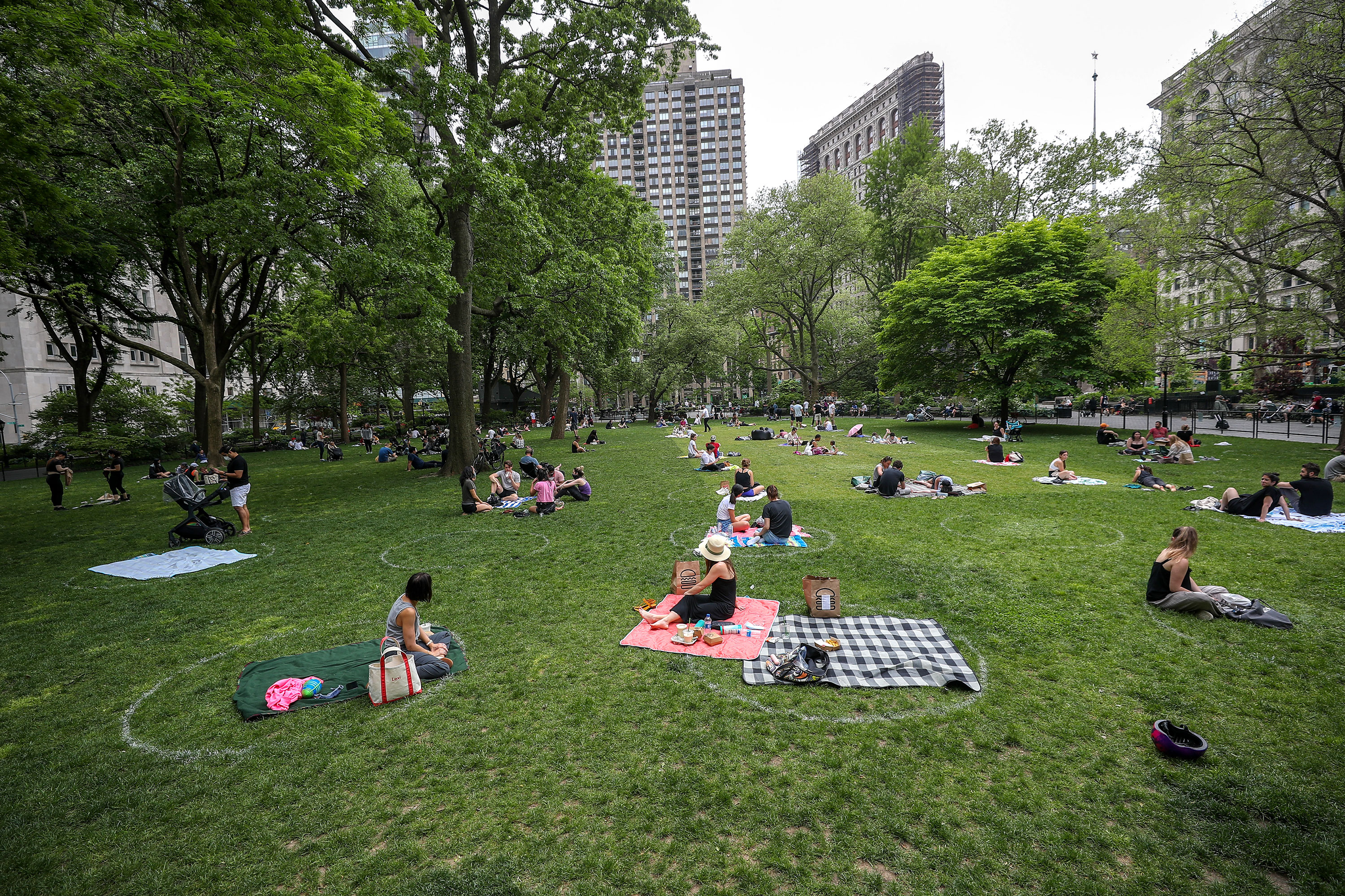 People practice social distancing at Madison Square Park in New York on May 22.