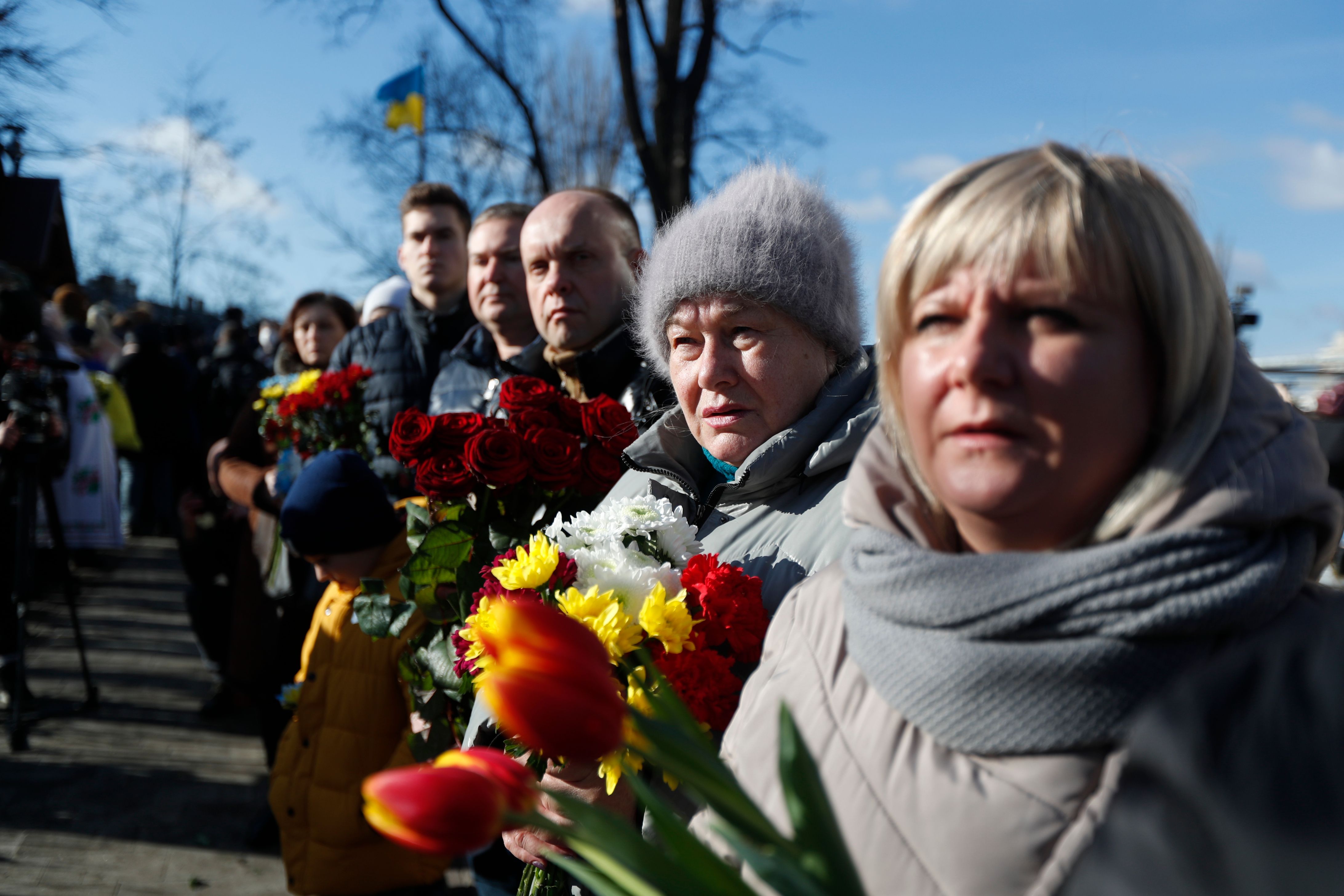 Ukrainians commemorate activists killed at Maidan Square during the 2014 anti-government protests in Kyiv, on Sunday February 20.