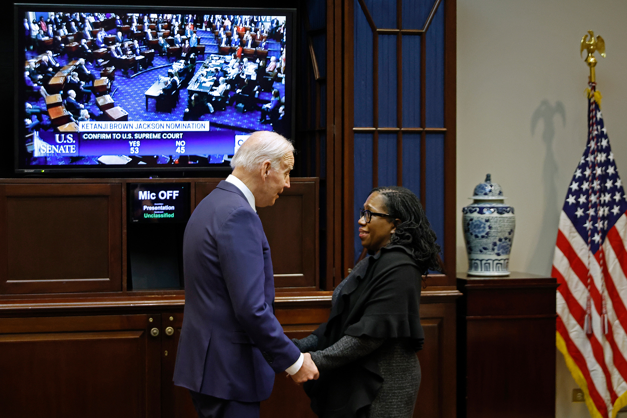 President Joe Biden congratulates Ketanji Brown Jackson as the Senate confirms her to be the first Black woman to be a justice on the Supreme Court in the Roosevelt Room at the White House on April 7 in Washington, DC. 
