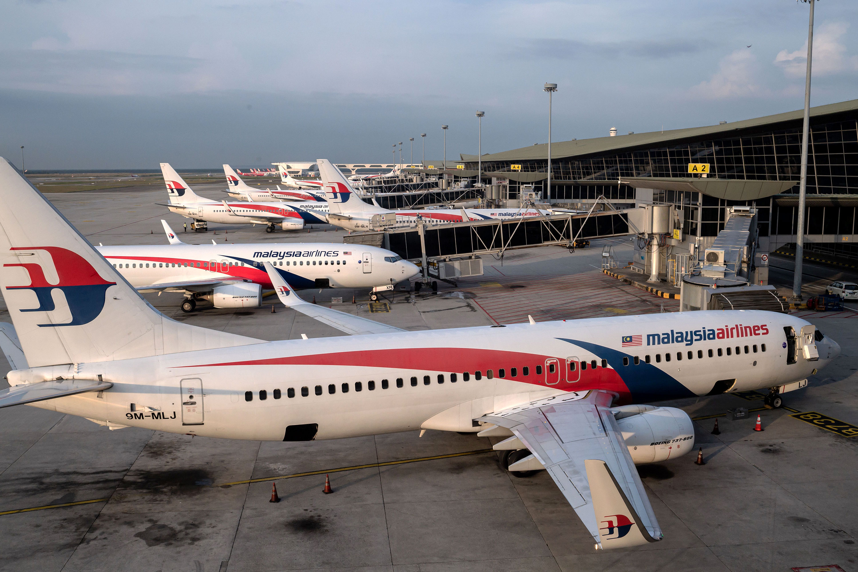 Malaysia Airlines planes sit on the tarmac at the Kuala Lumpur International Airport in Kuala Lumpur, Malaysia on February 14. 