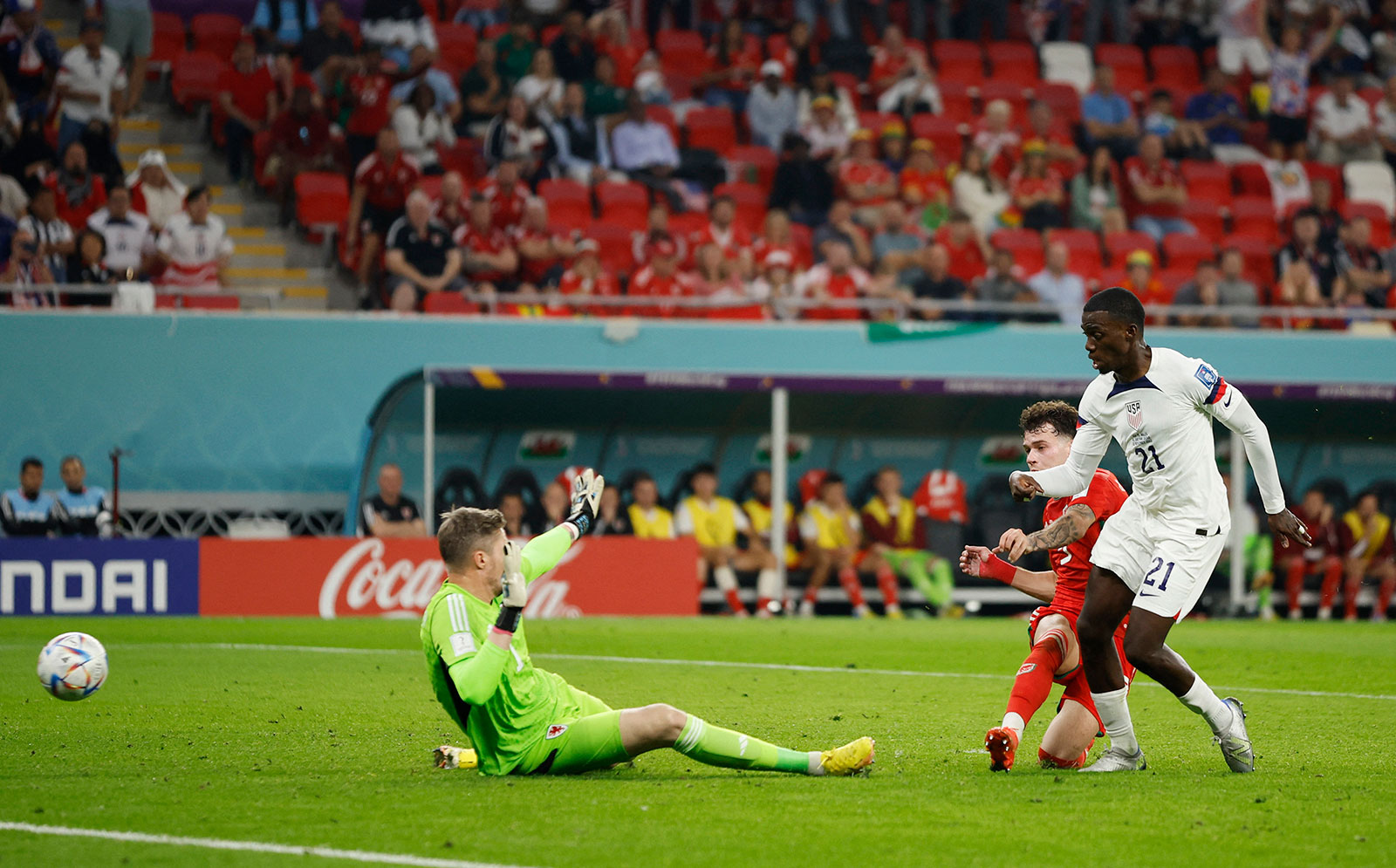 USA's Timothy Weah scores the first goal of the match against Wales on November 21.