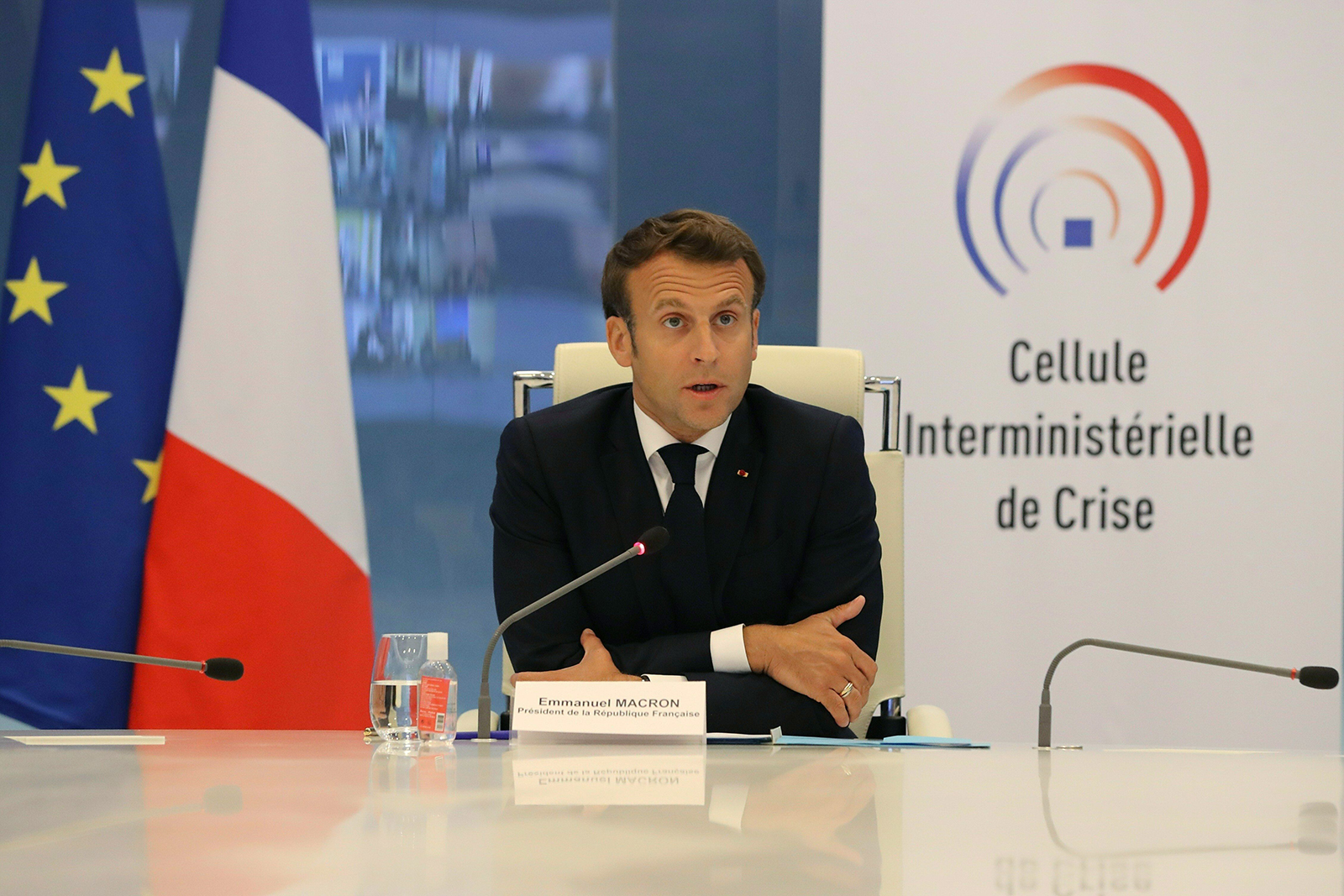 French President Emmanuel Macron takes part in a video conference at the Crisis Center of the Interior Ministry, on May 13, in Paris.