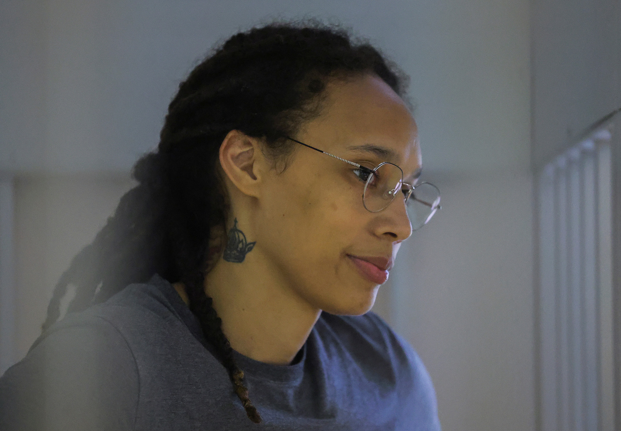 Brittney Griner sits inside a defendants' cage before the court's verdict in Khimki, Russia on August 4. 