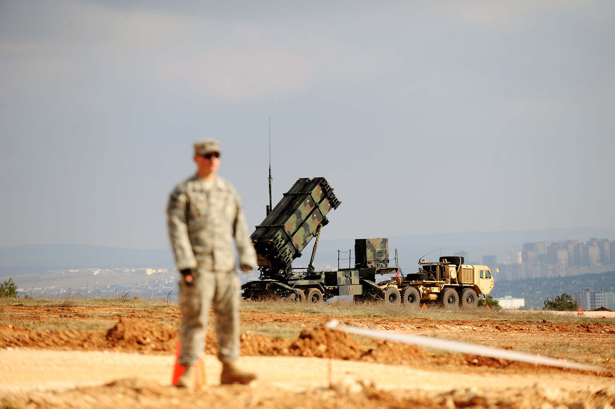 A US soldier stands near a Patriot missile system at a Turkish military base in Gaziantep on February 5, 2013. 