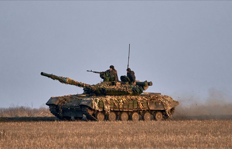 Ukrainian soldiers ride atop a tank on the front line in Bakhmut, Donetsk region, Ukraine on Wednesday, March 22.
